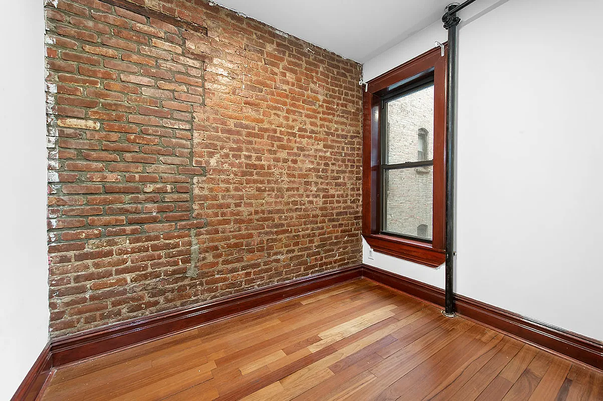 119 East 96th Street, Unit 20 Manhattan, NY 10128 - Photo 4 of 6 a view of outdoor space with wooden floor
