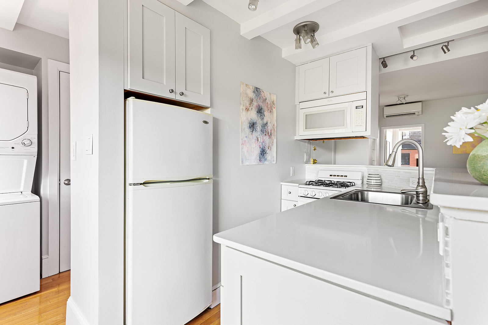 334 Union Street, Unit 3 Brooklyn, NY 11231 - Photo 3 of 10 a white refrigerator freezer sitting inside of a kitchen