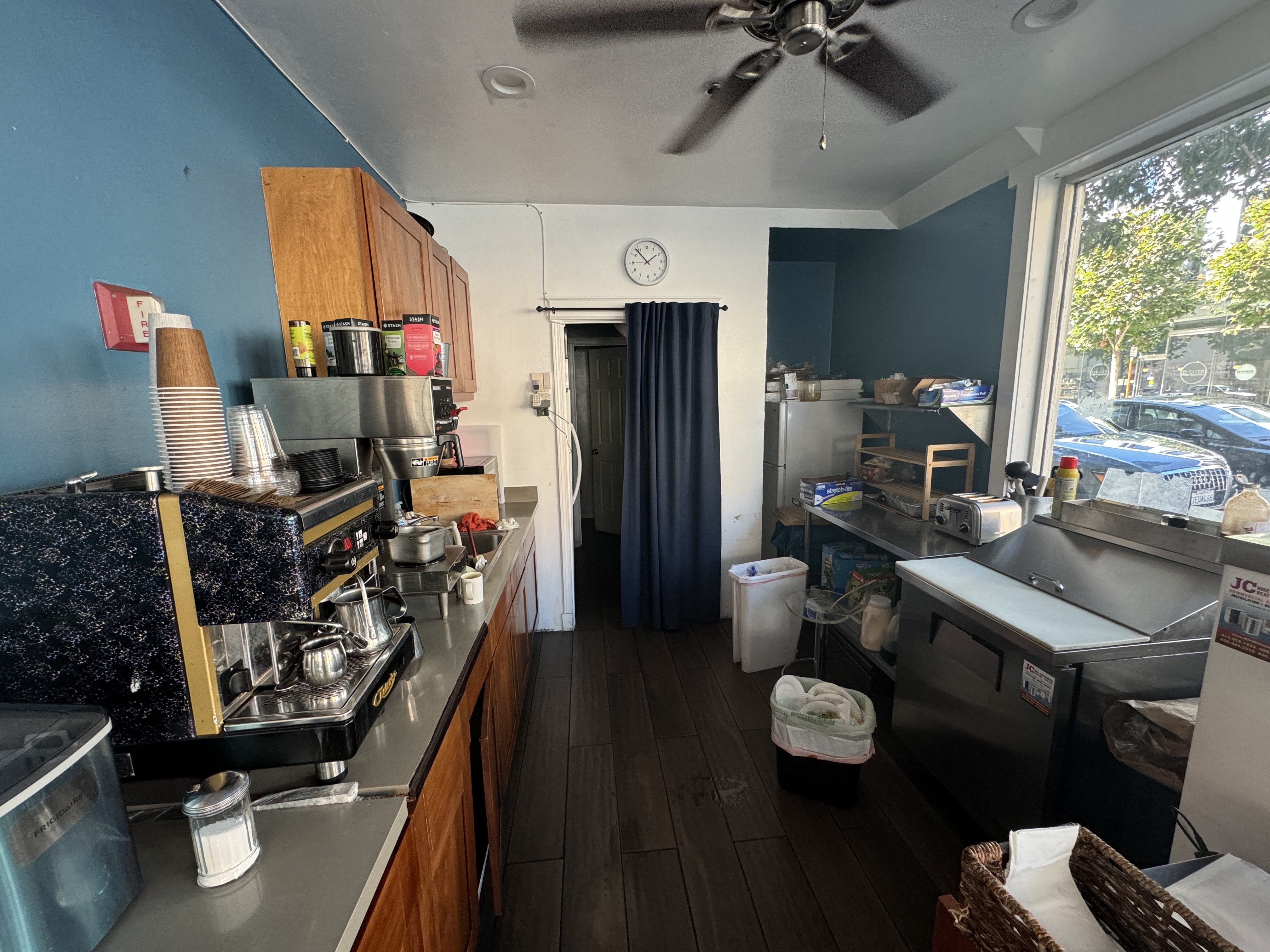 201 Fell Street San Francisco, CA 94102 - Photo 6 of 30 a view of a workspace with furniture and a window