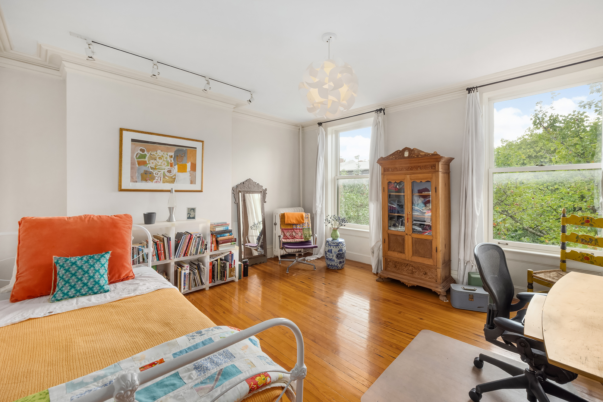 128 State Street, Unit 2 Brooklyn, NY 11201 - Photo 13 of 15 a living room with furniture and a large window