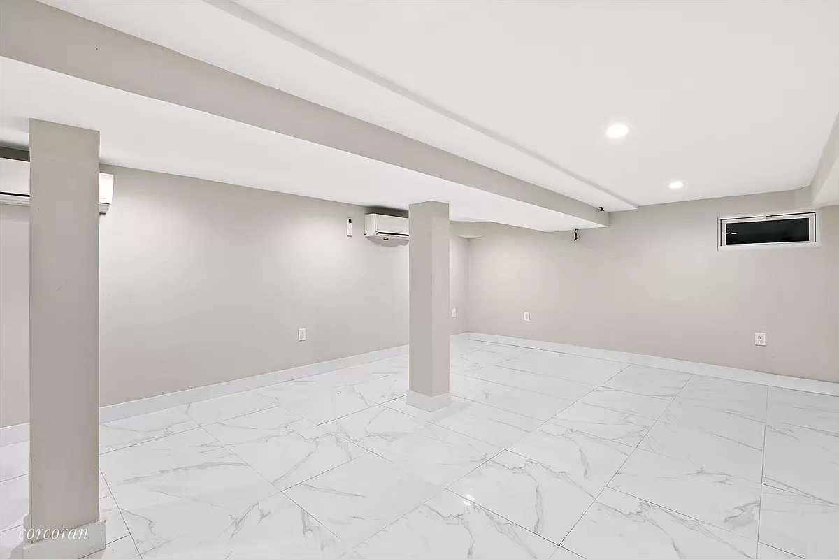 1118 Decatur Street Brooklyn, NY 11207 - Photo 16 of 18 a view of a room with an empty room