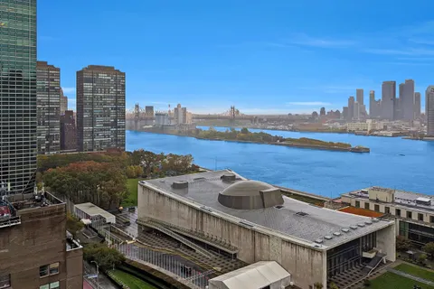 a view of a balcony with city view