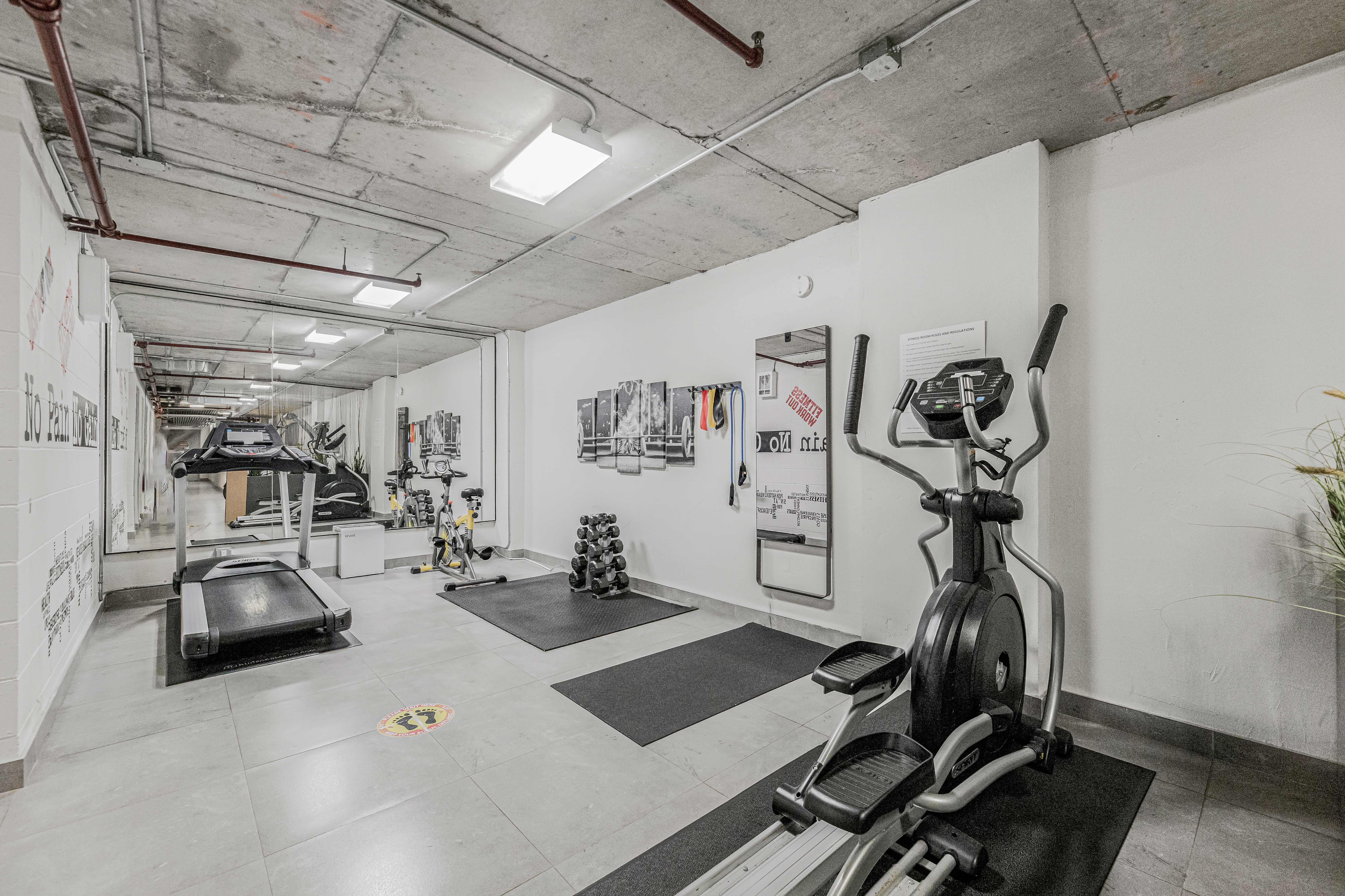 42-50 27th Street, Unit 9C Queens, NY 11101 - Photo 23 of 32 a view of a room with gym equipment