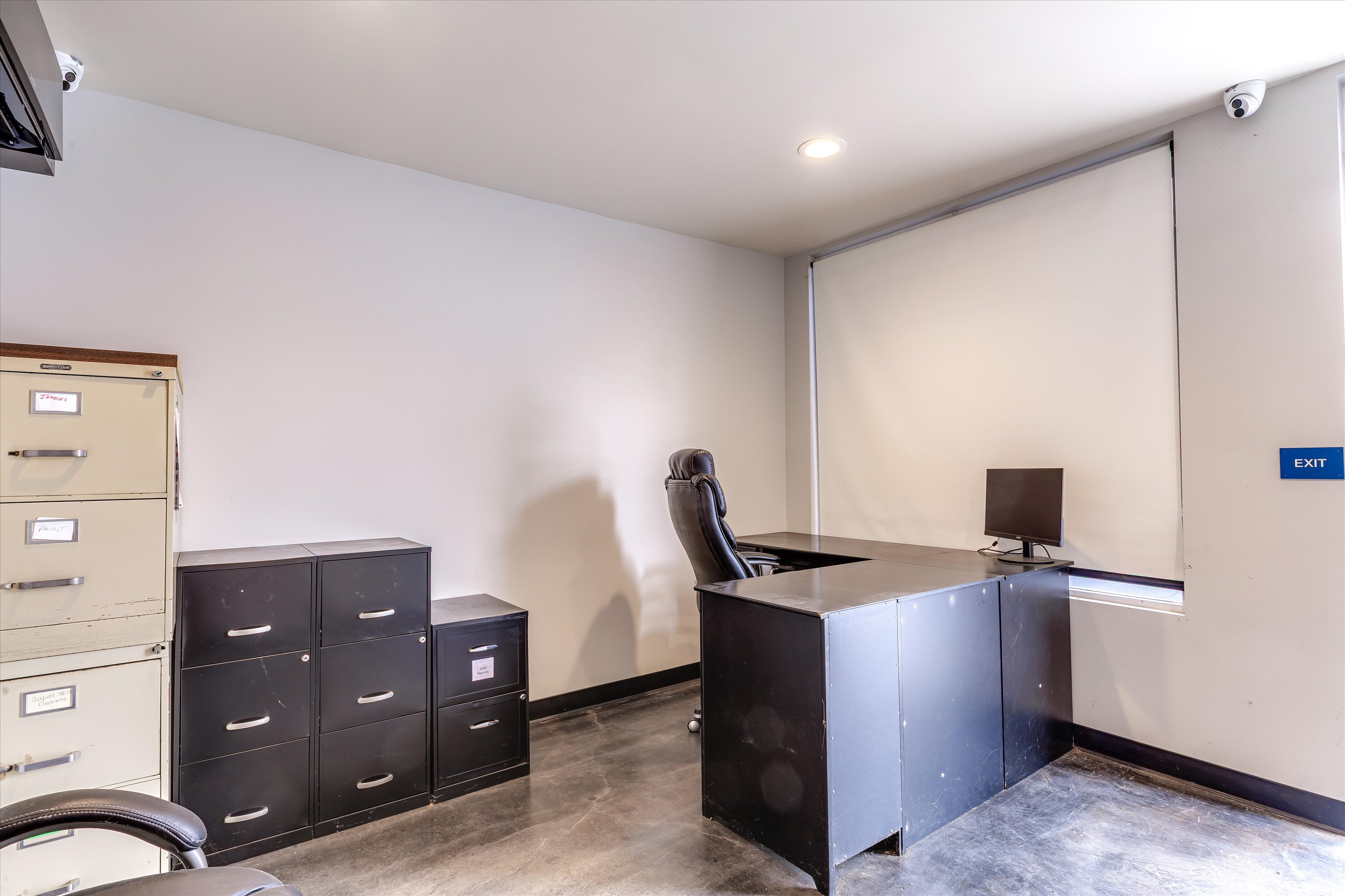 930 Huber Street, Unit H Grover Beach, CA 93433 - Photo 14 of 18 a view of workspace with cabinets