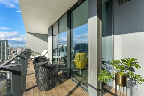 a view of balcony with a potted plant
