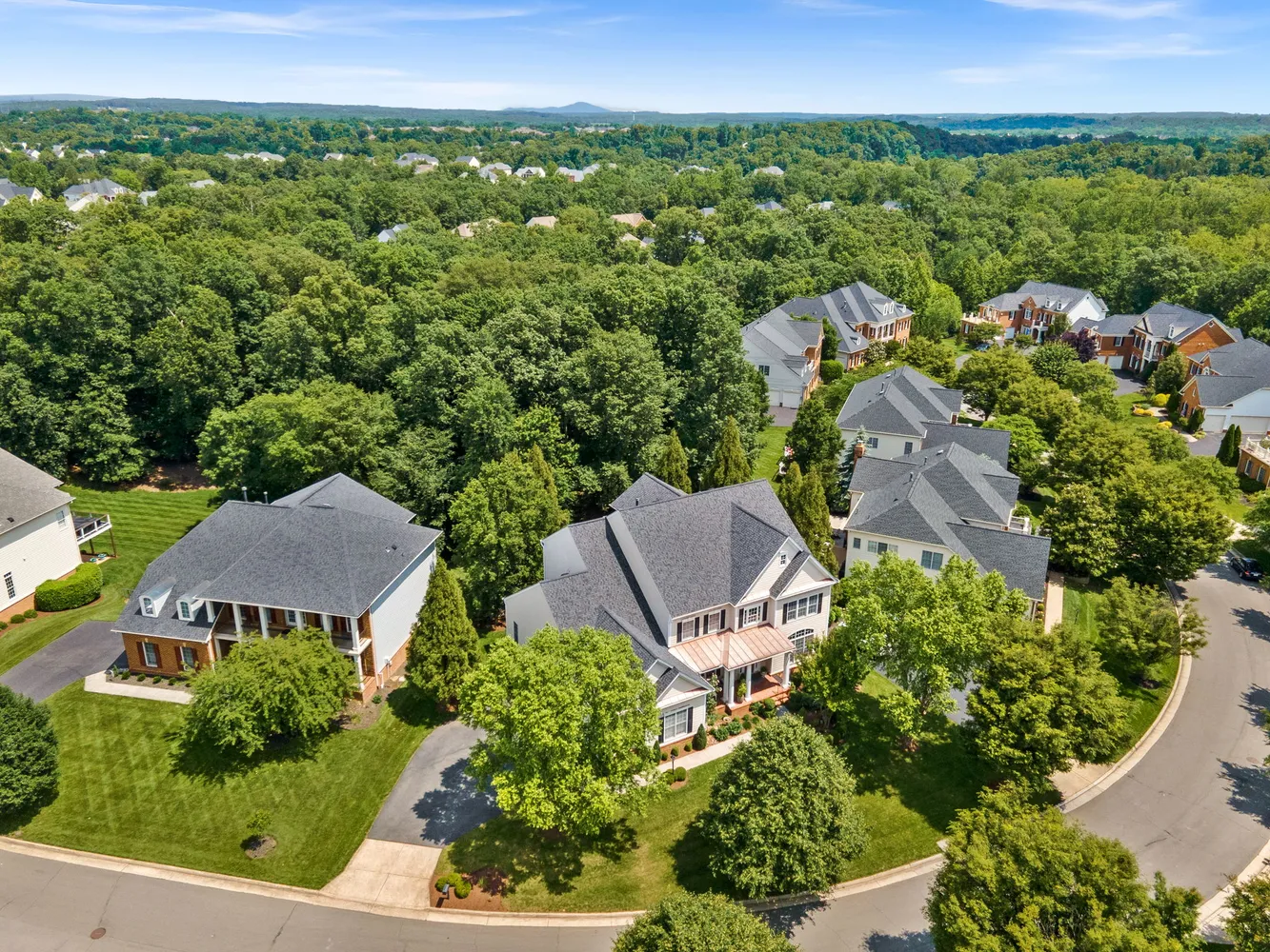an aerial view of multiple house