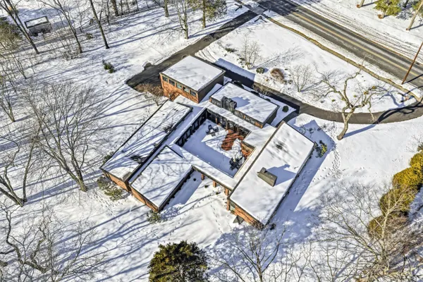 a view of a house with a bed
