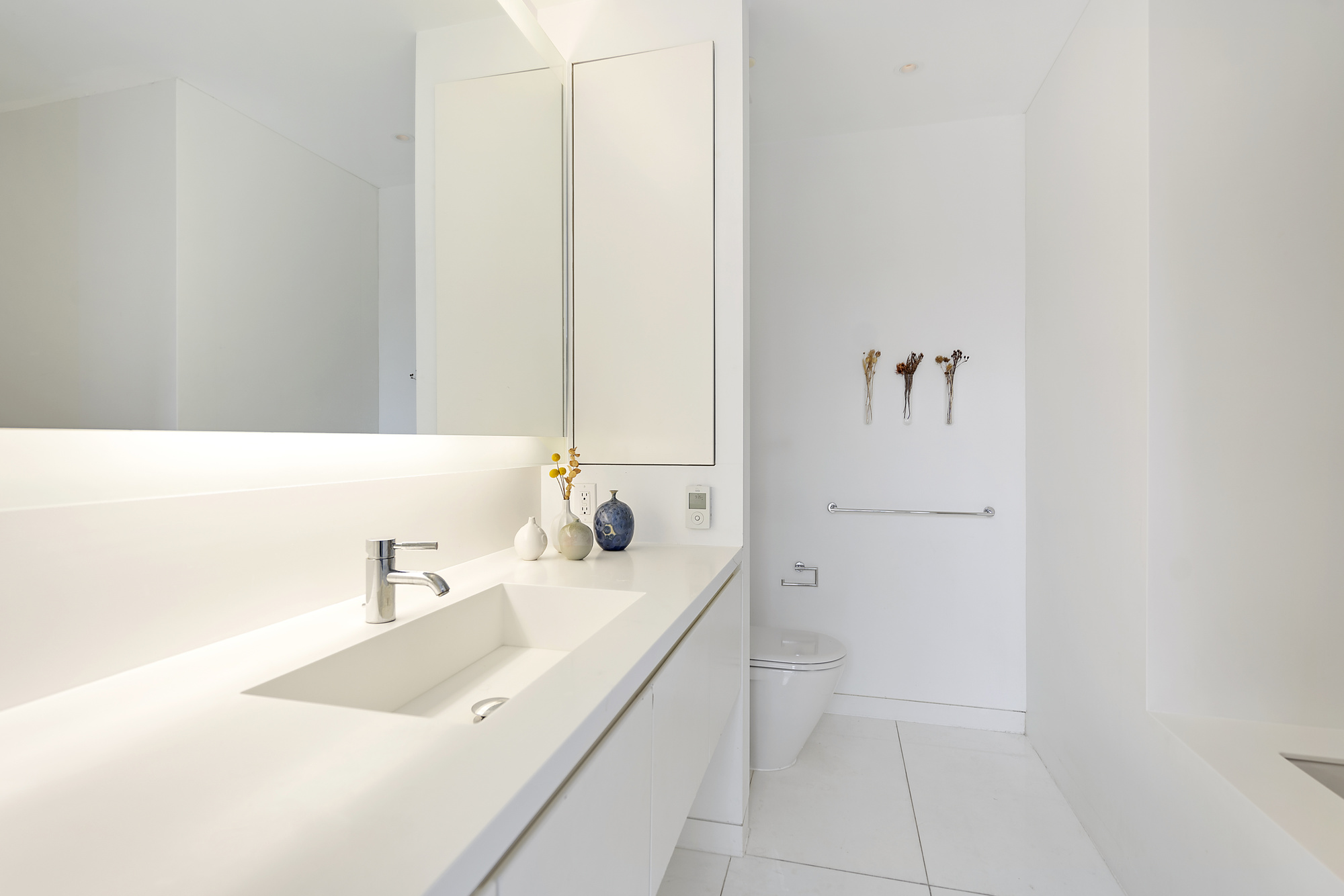 1 Grand Army Plaza, Unit 4B Brooklyn, NY 11238 - Photo 7 of 20 a bathroom with a sink and a mirror