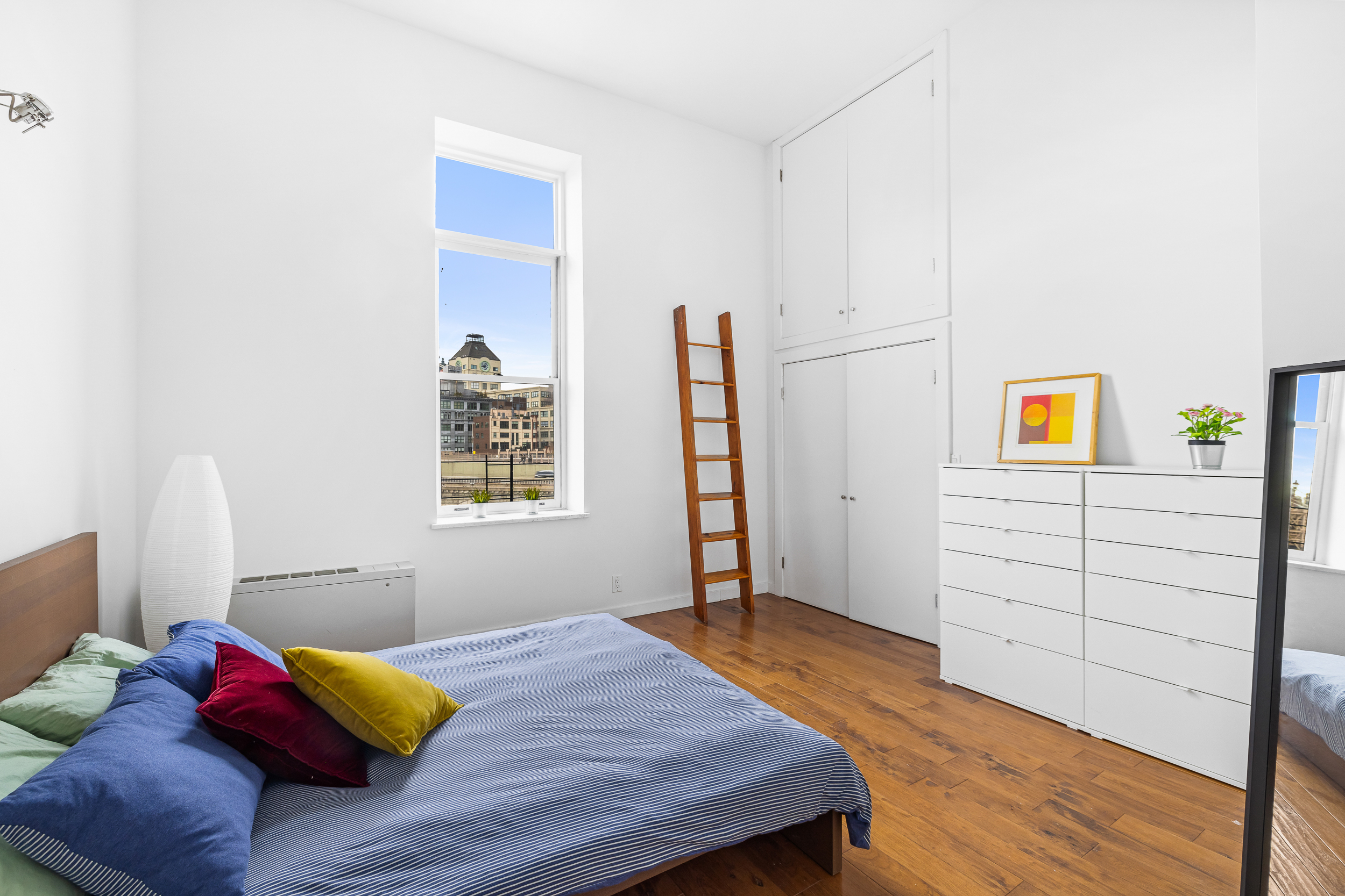 55 Poplar Street, Unit 6K Brooklyn, NY 11201 - Photo 7 of 15 a bedroom with a bed and a couch