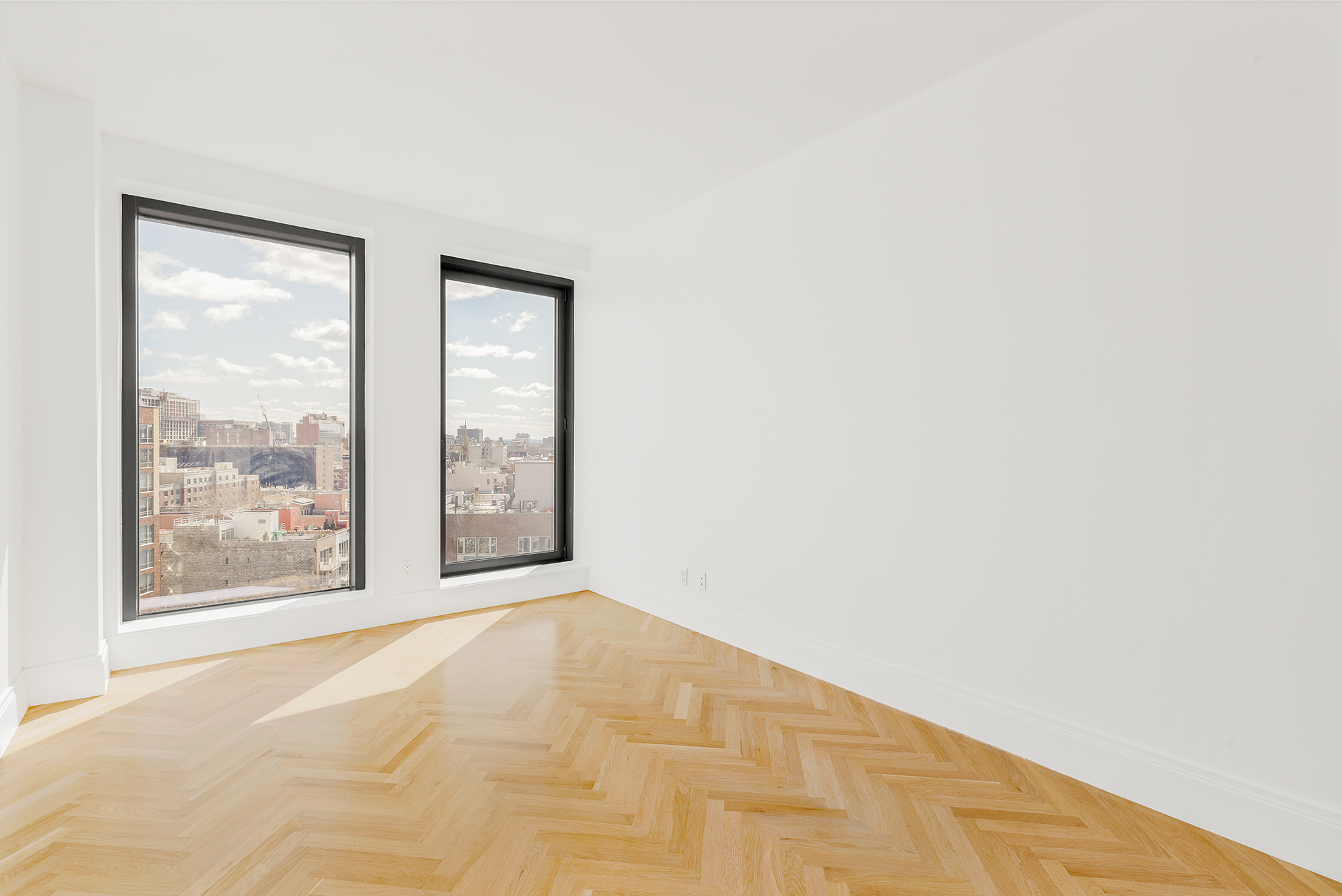 300 West 122nd Street, Unit 12C Manhattan, NY 10027 - Photo 8 of 11 a view of an empty room with a window