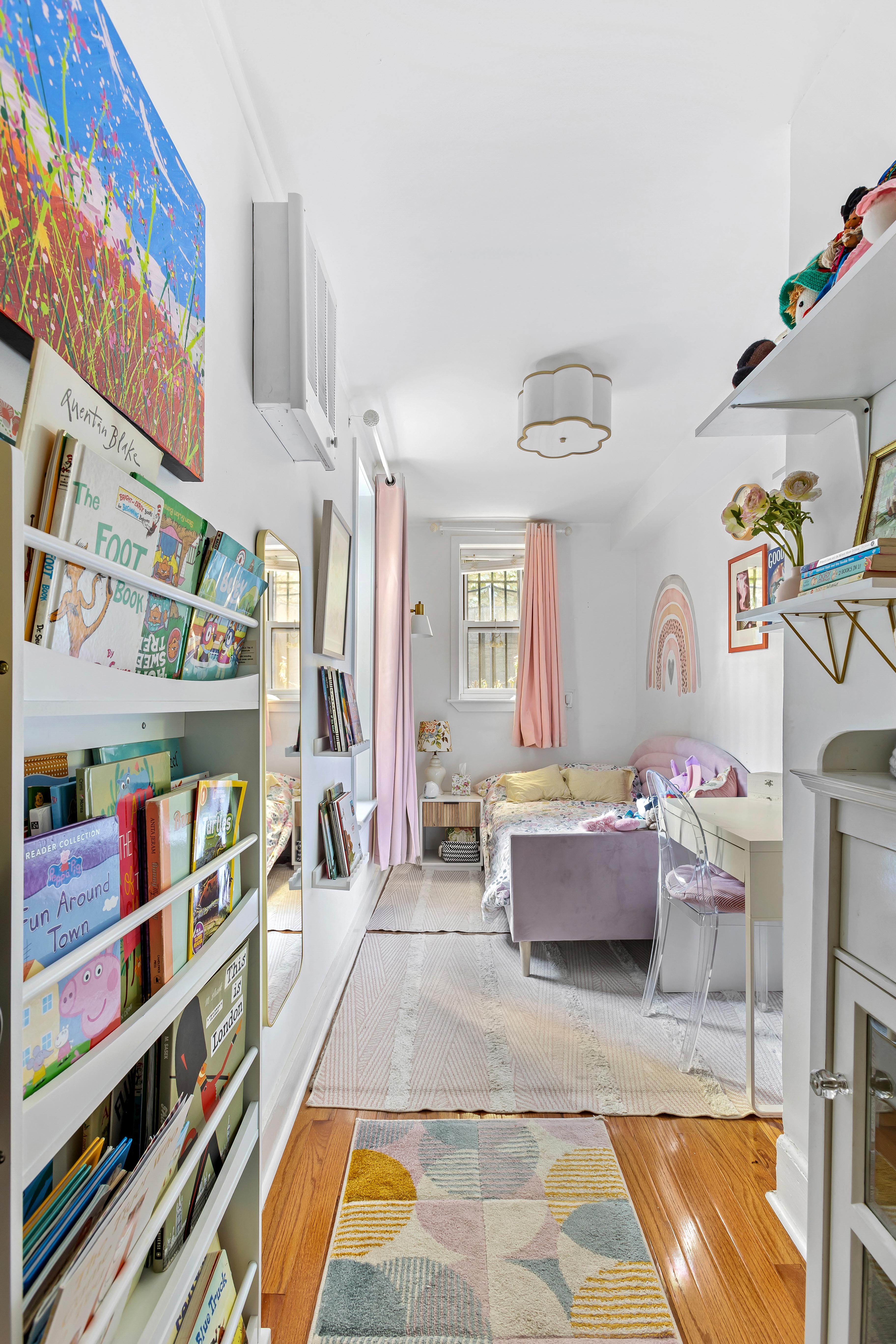227 Garfield Place, Unit Garden Duplex Brooklyn, NY 11215 - Photo 11 of 15 a living room with furniture and a book shelf