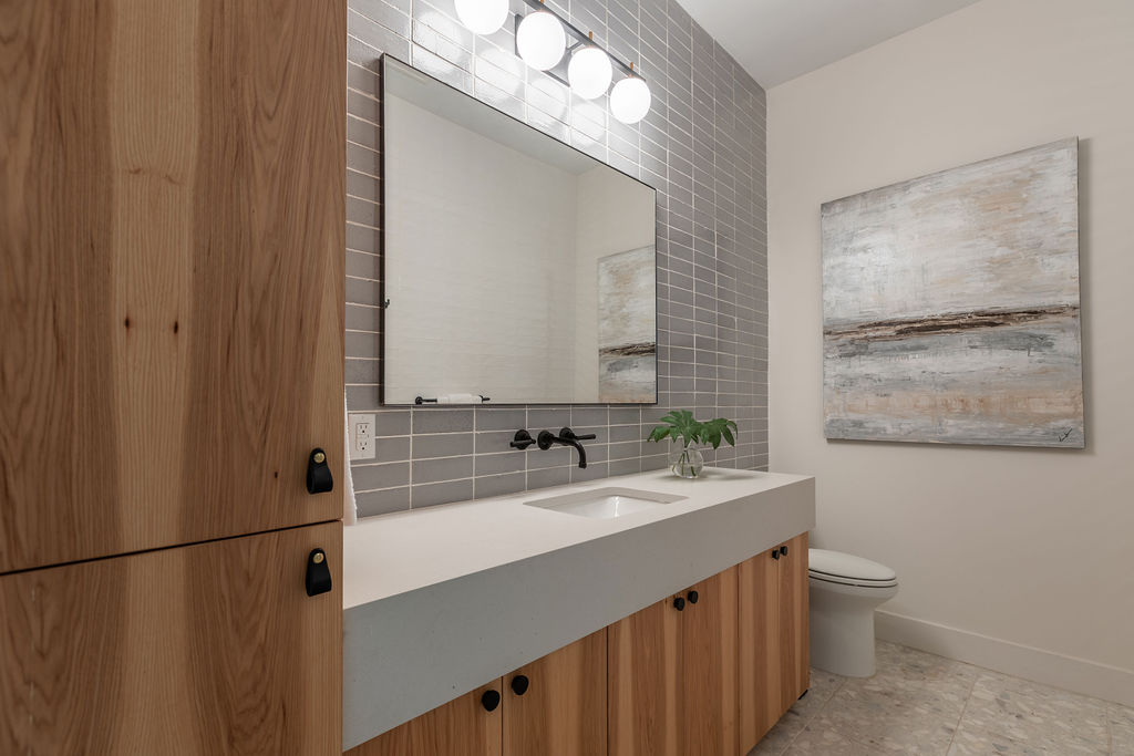 400 Inwood Road Austin, TX 78746 - Photo 23 of 43 a bathroom with a double vanity sink mirror and toilet