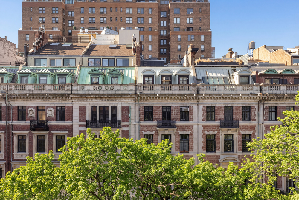 33 West 74th Street, Unit 2 Manhattan, NY 10023 - Photo 14 of 15 an aerial view of a residential apartment building with a yard and plants