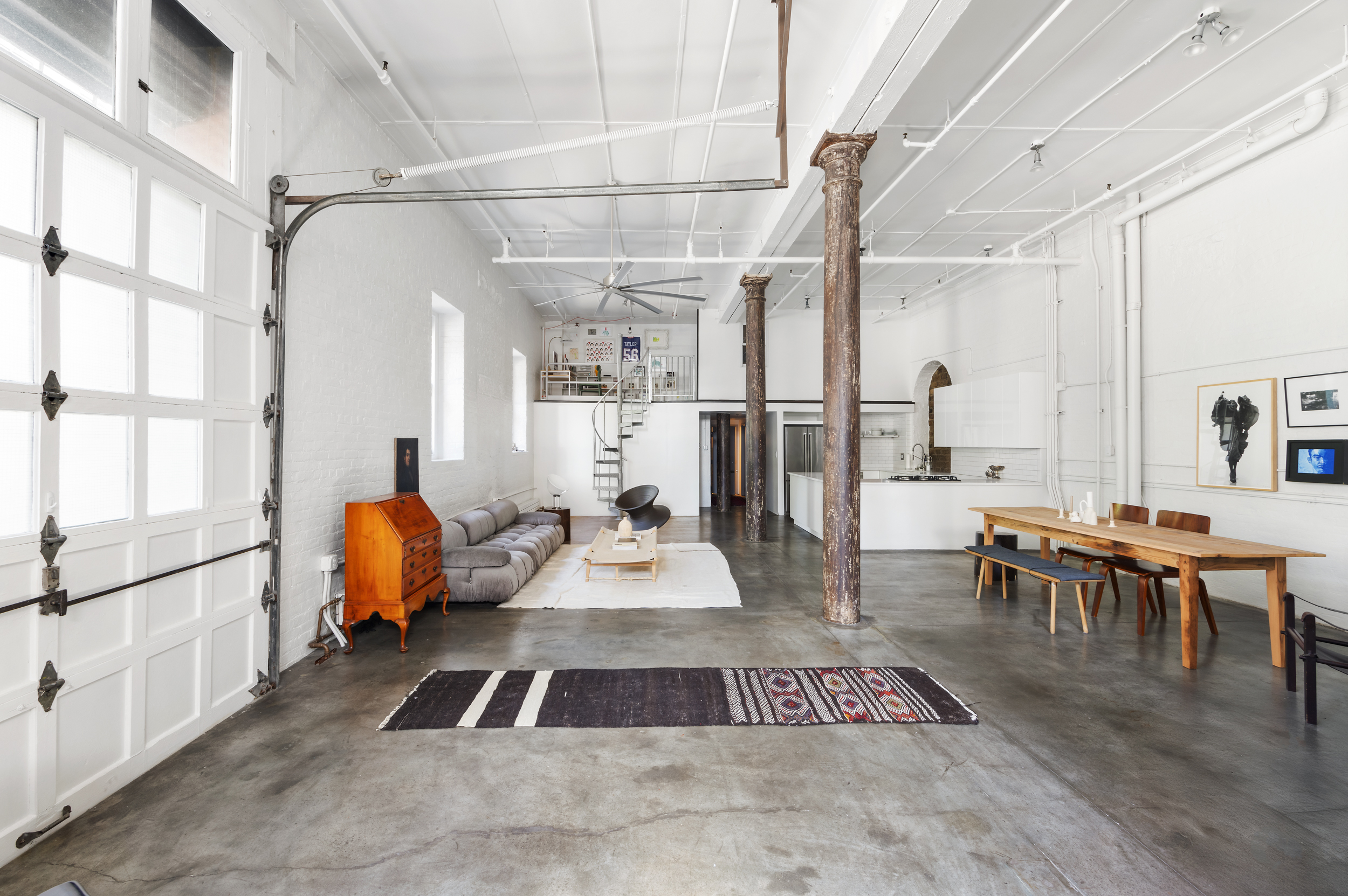 125 Watts Street, Unit 1 Manhattan, NY 10013 - Photo 5 of 24 a very nice looking room with a large window