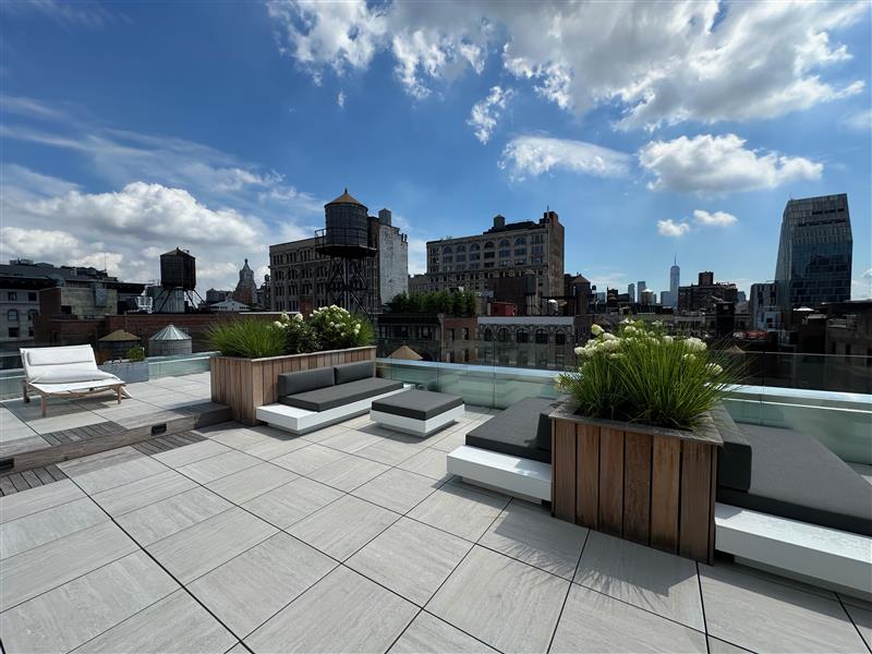 16 West 19th Street, Unit 8B Manhattan, NY 10011 - Photo 13 of 19 a view of a terrace with couches and potted plants