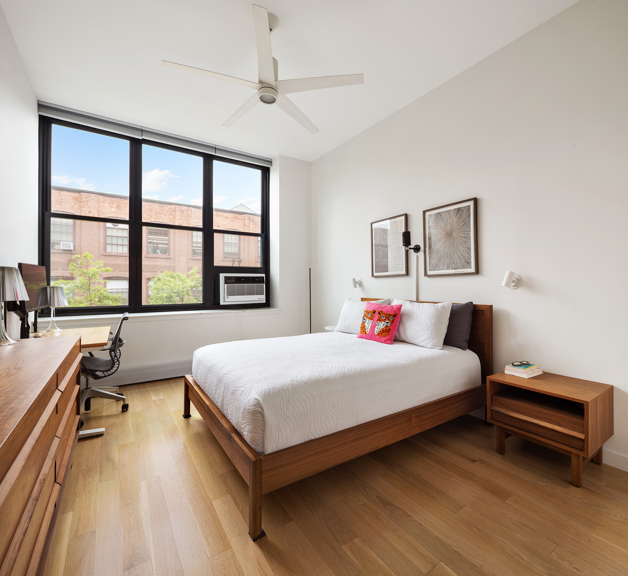 372 Dekalb Avenue, Unit 5J Brooklyn, NY 11205 - Photo 5 of 10 a bedroom with a bed and a large window