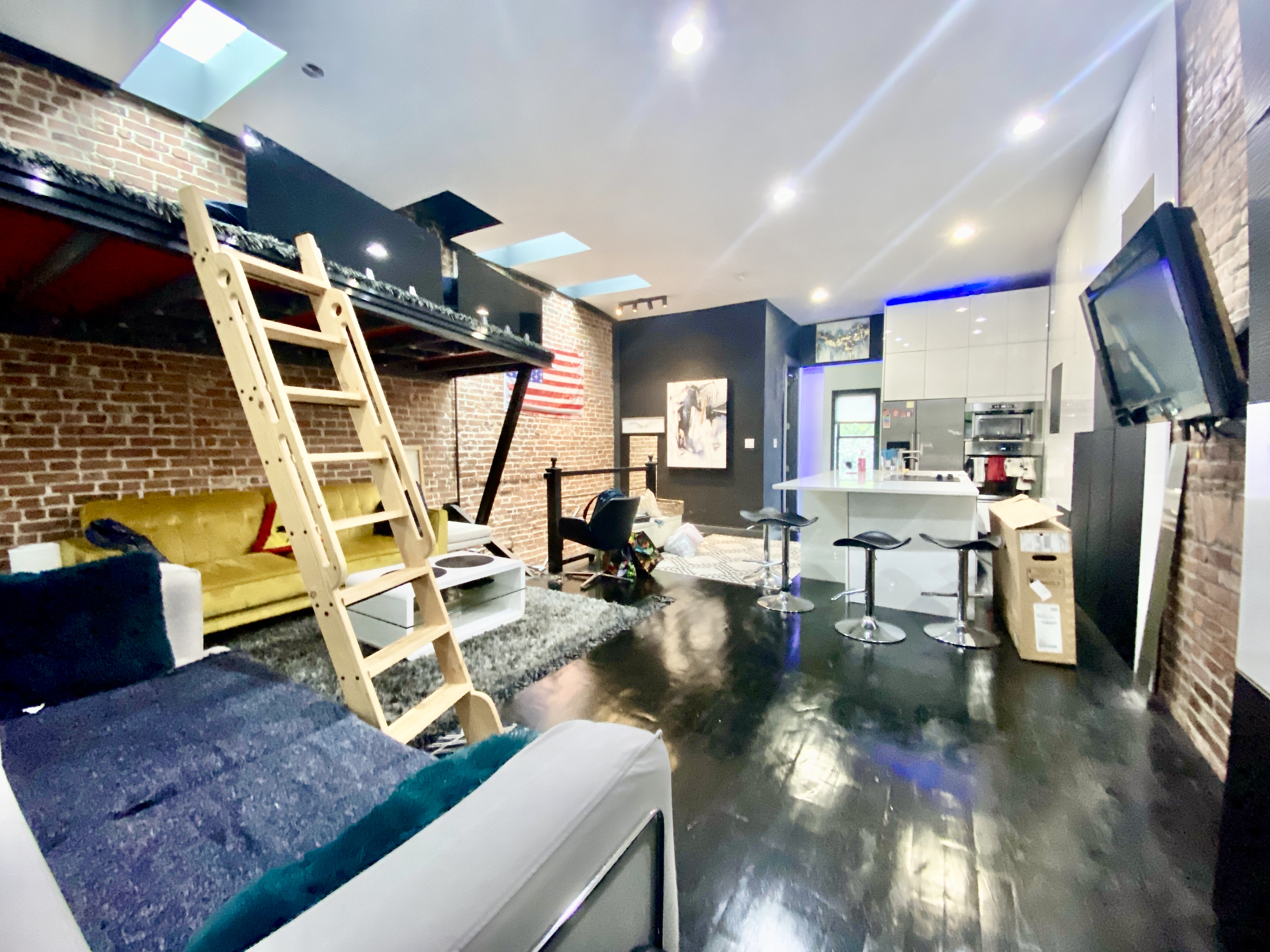 420 Kosciuszko Street, Unit 3 Brooklyn, NY 11221 - Photo 3 of 8 a view of a room with gym equipment