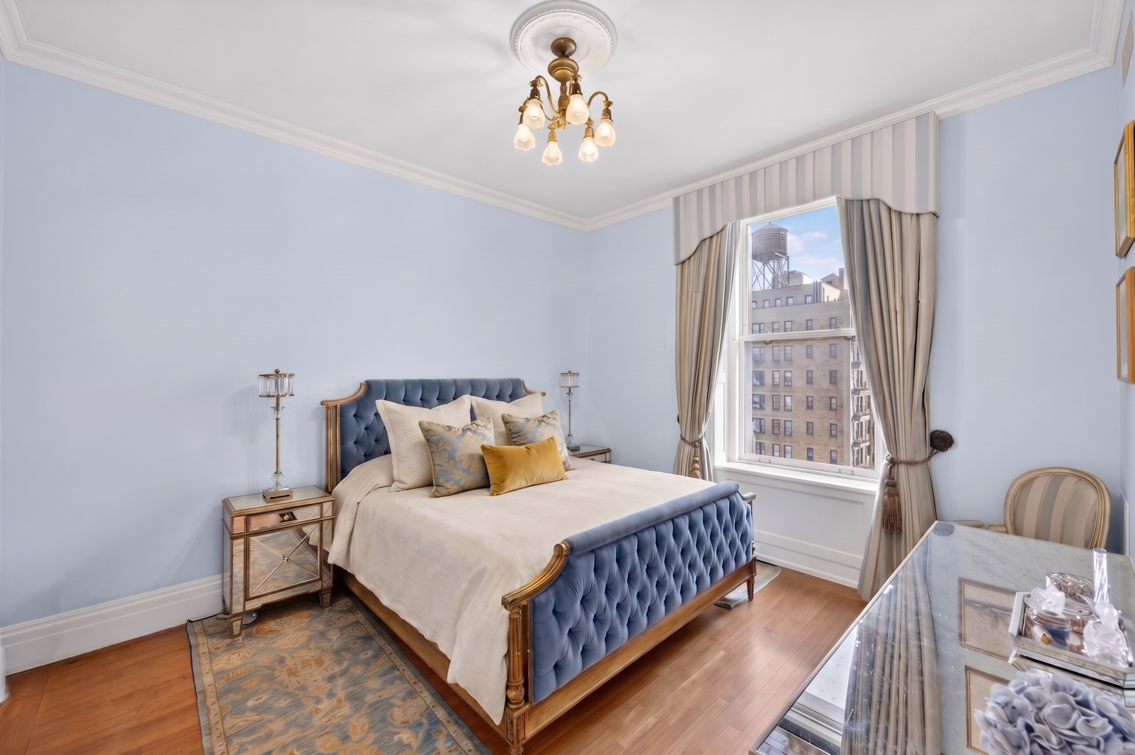 390 West End Avenue, Unit 11C Manhattan, NY 10024 - Photo 12 of 28 a bedroom with a bed and window