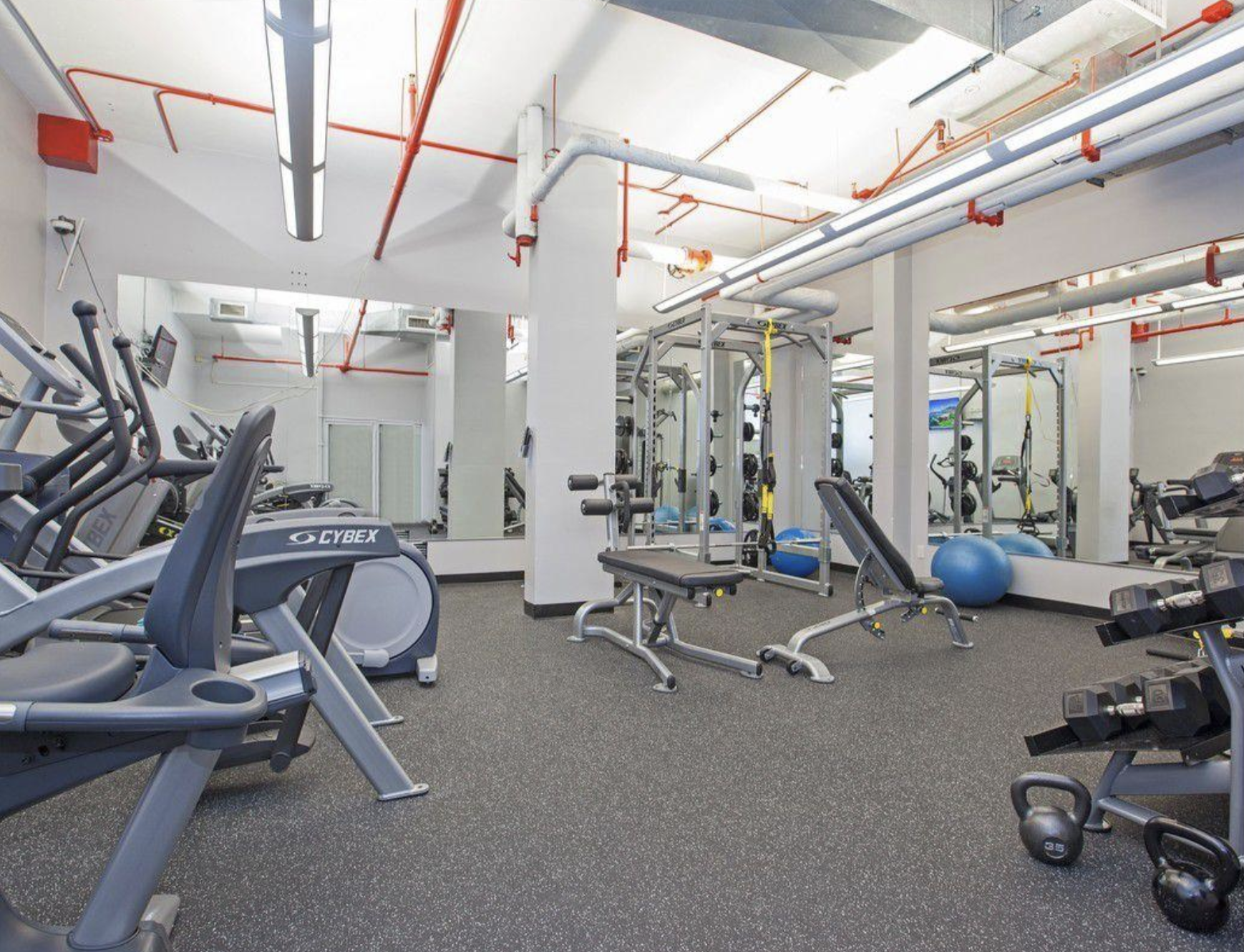150 East 85th Street, Unit 5F Manhattan, NY 10028 - Photo 6 of 9 a view of a room with gym equipment