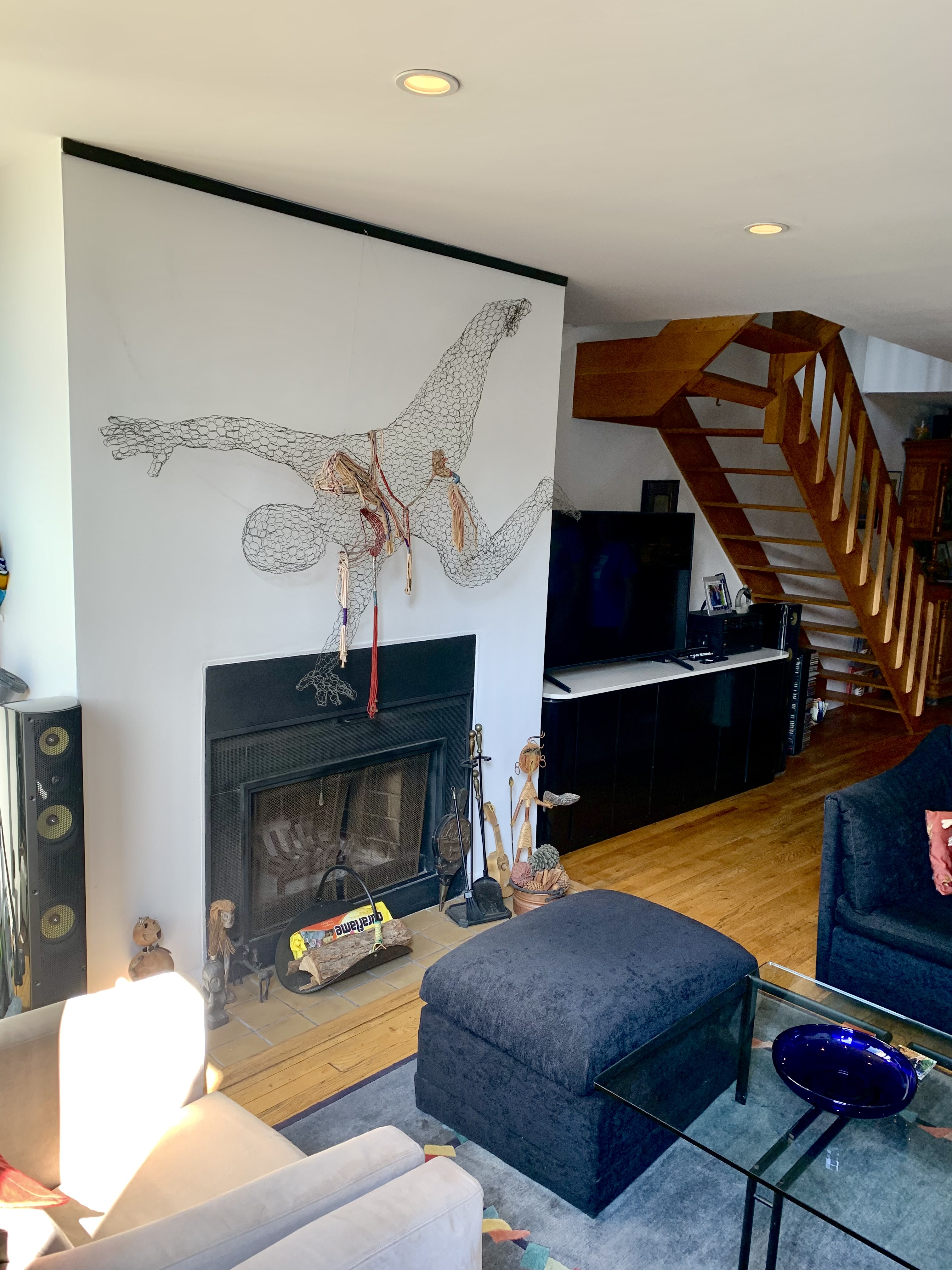 130 Barrow Street, Unit PH508 Manhattan, NY 10014 - Photo 3 of 14 a living room with furniture and a fireplace