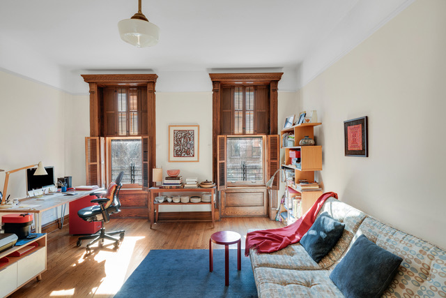 347 West 121st Street Manhattan, NY 10027 - Photo 7 of 16 a living room with furniture window and a wooden floor