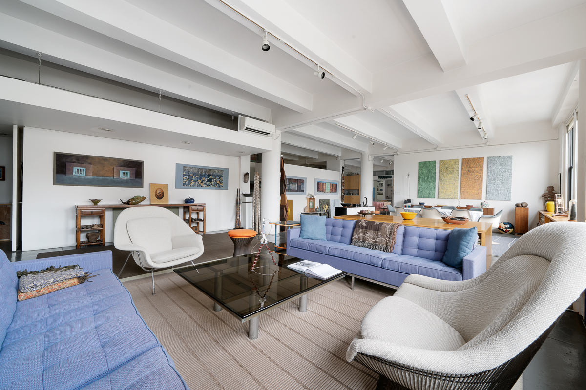 477 Washington Street Manhattan, NY 10013 - Photo 17 of 20 a living room with furniture or couch and a wooden floor