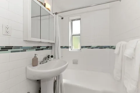 a bathroom with a sink and a bathtub