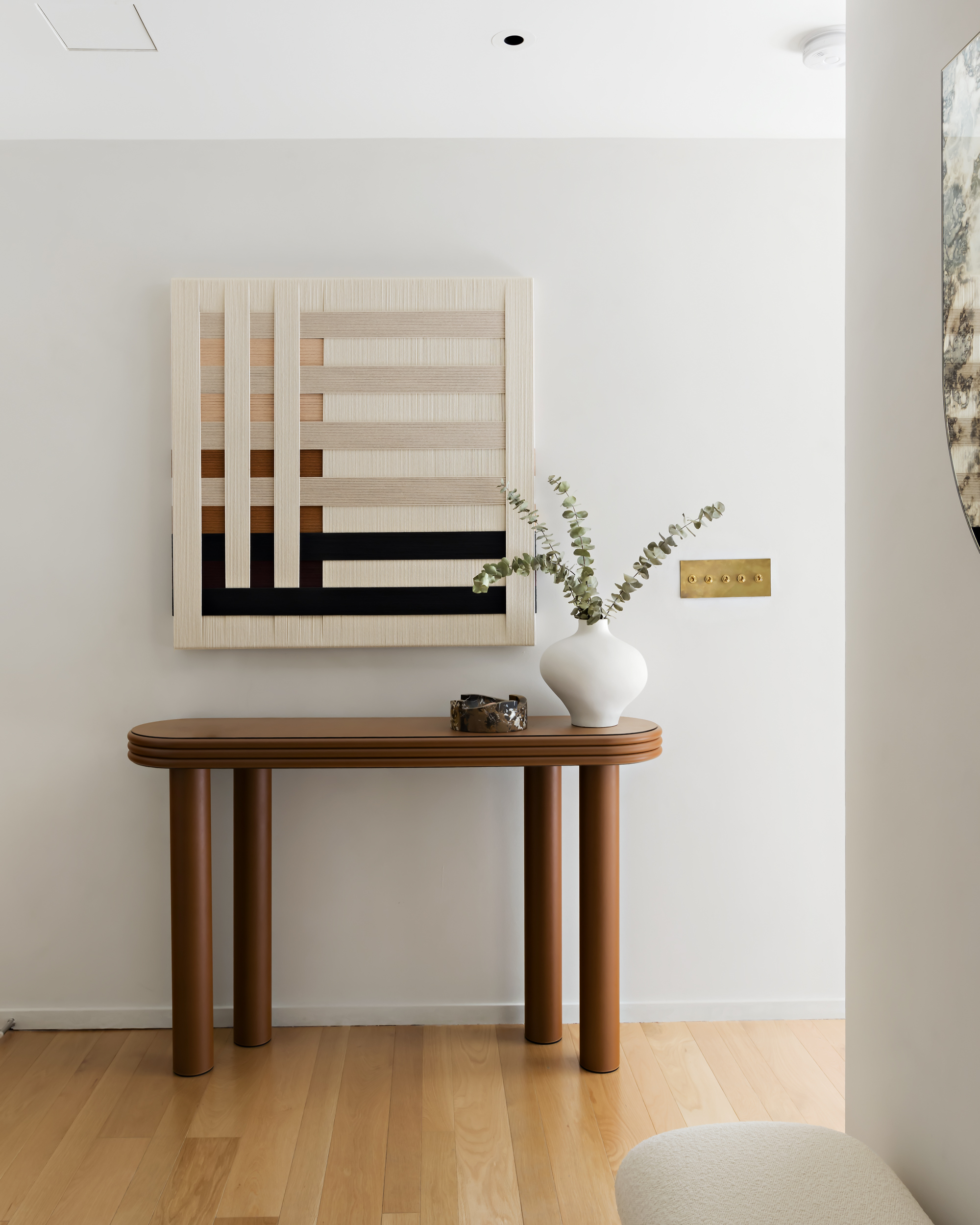 75 Kenmare Street, Unit 2D Manhattan, NY 10012 - Photo 10 of 15 a room with a table and a potted plant