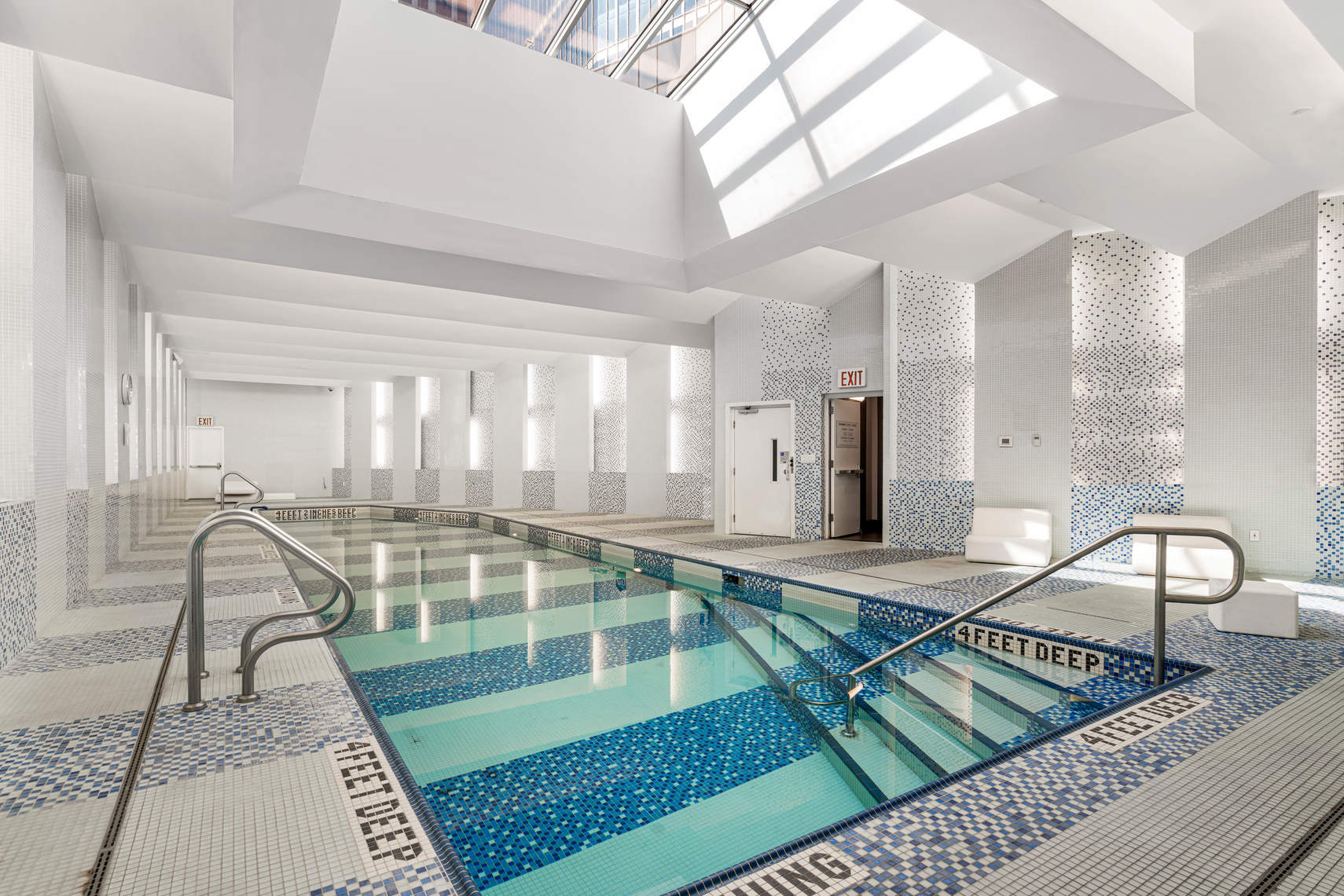 150 Myrtle Avenue, Unit 1902 Brooklyn, NY 11201 - Photo 13 of 27 a view of a swimming pool with a lounge chairs