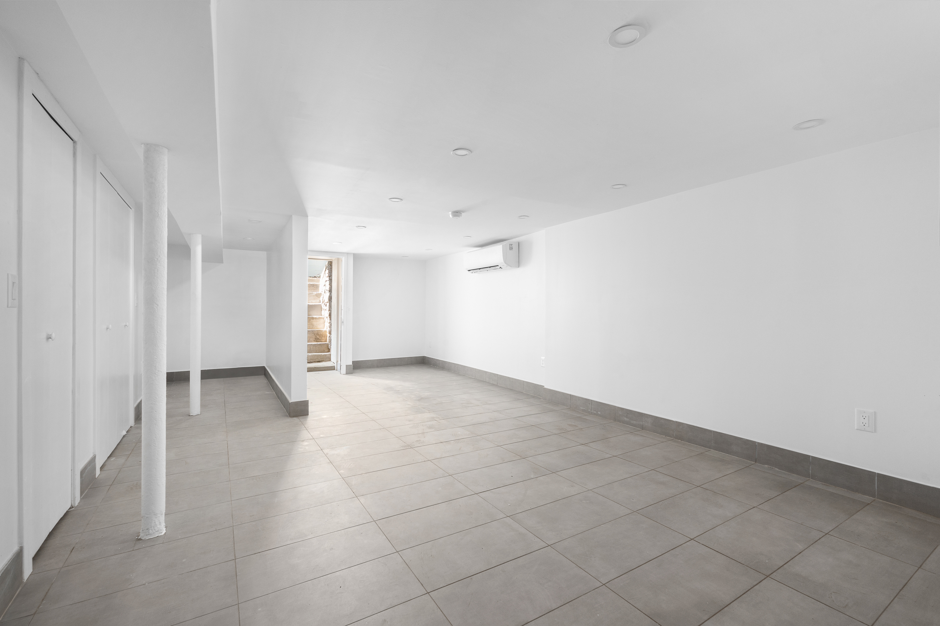 92 Wilson Avenue Brooklyn, NY 11237 - Photo 10 of 15 a view of an empty room