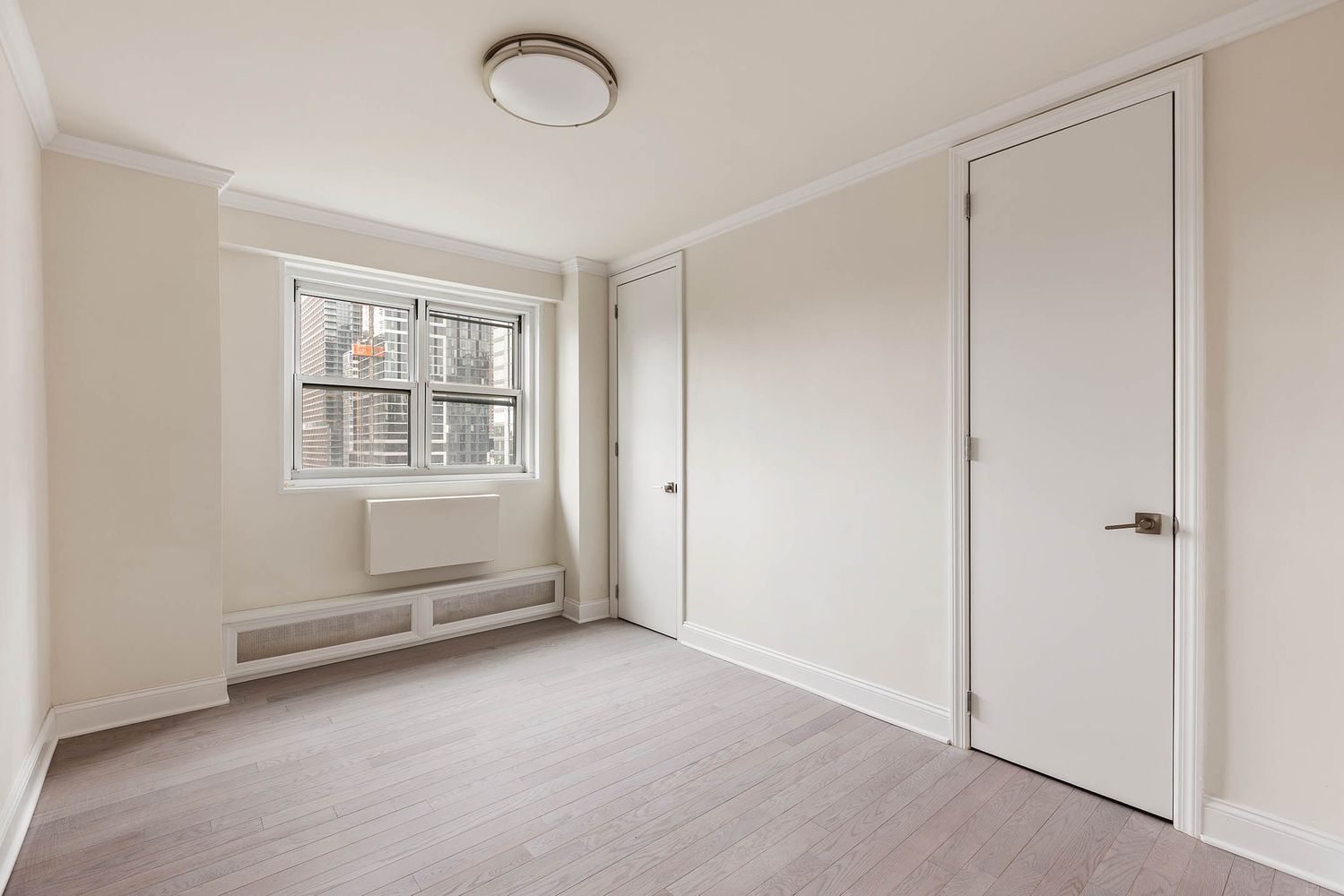 an empty room with windows