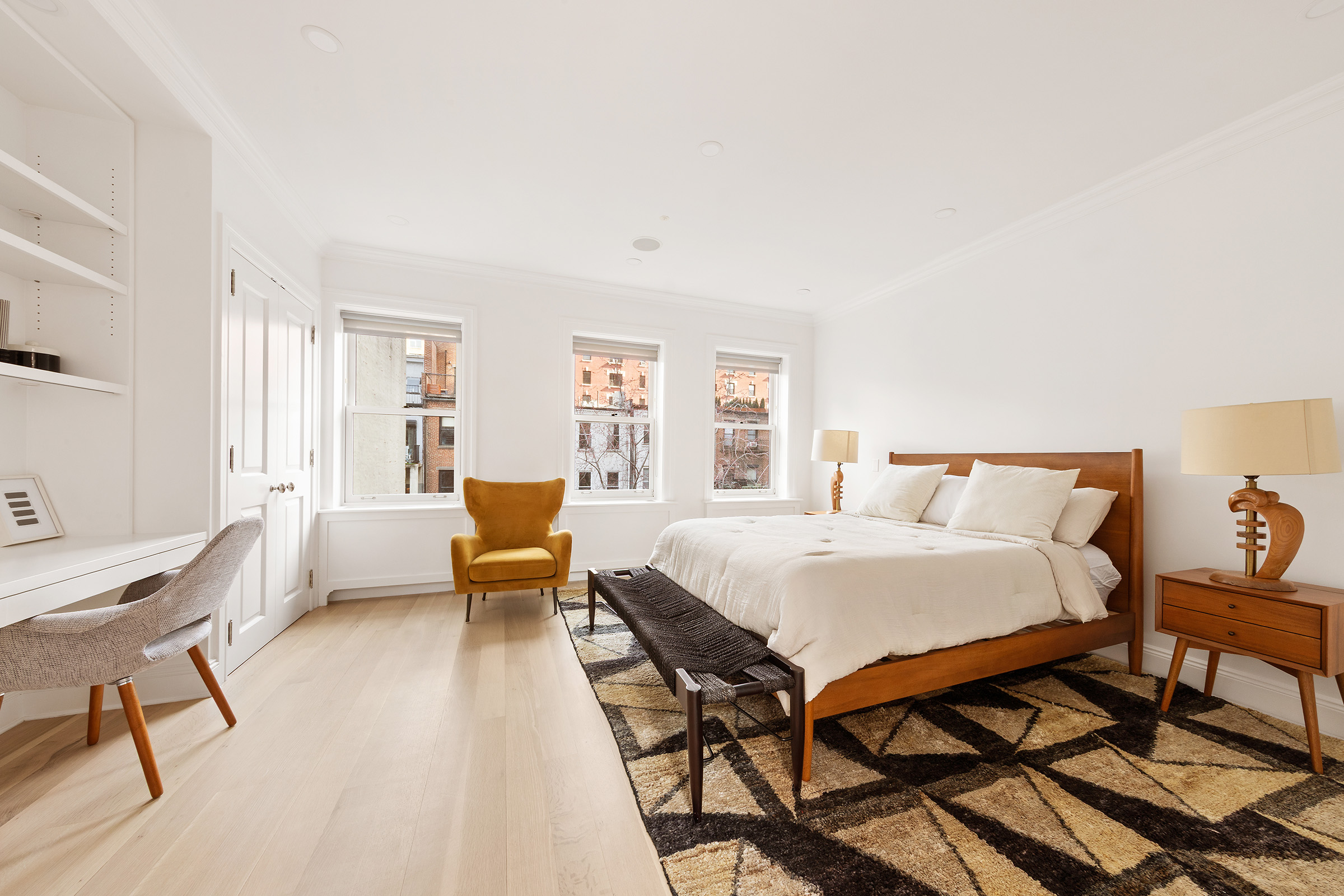 9 West 84th Street Manhattan, NY 10024 - Photo 20 of 31 a bed room with a bed and a chair