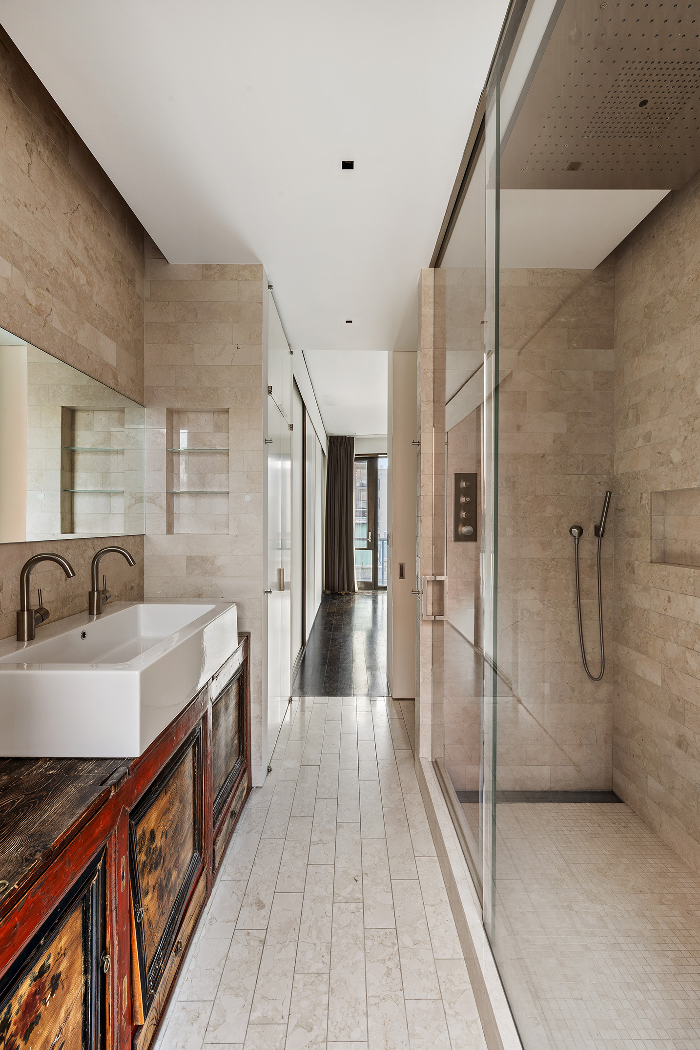 35 Spring Street Manhattan, NY 10012 - Photo 8 of 14 a kitchen with a sink and refrigerator