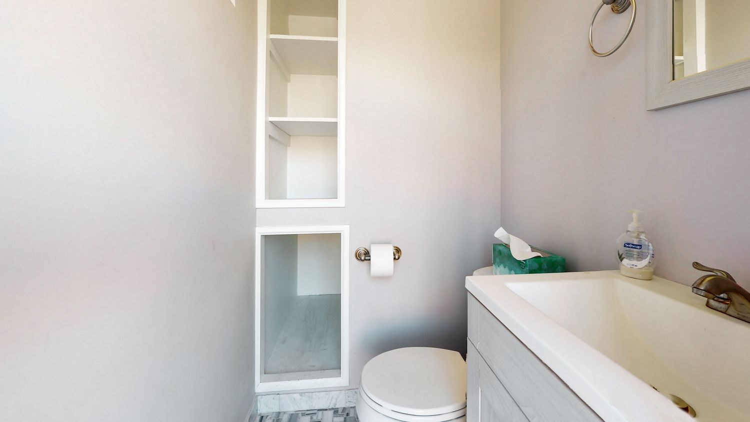 a outdoor dining space with a table and chairs