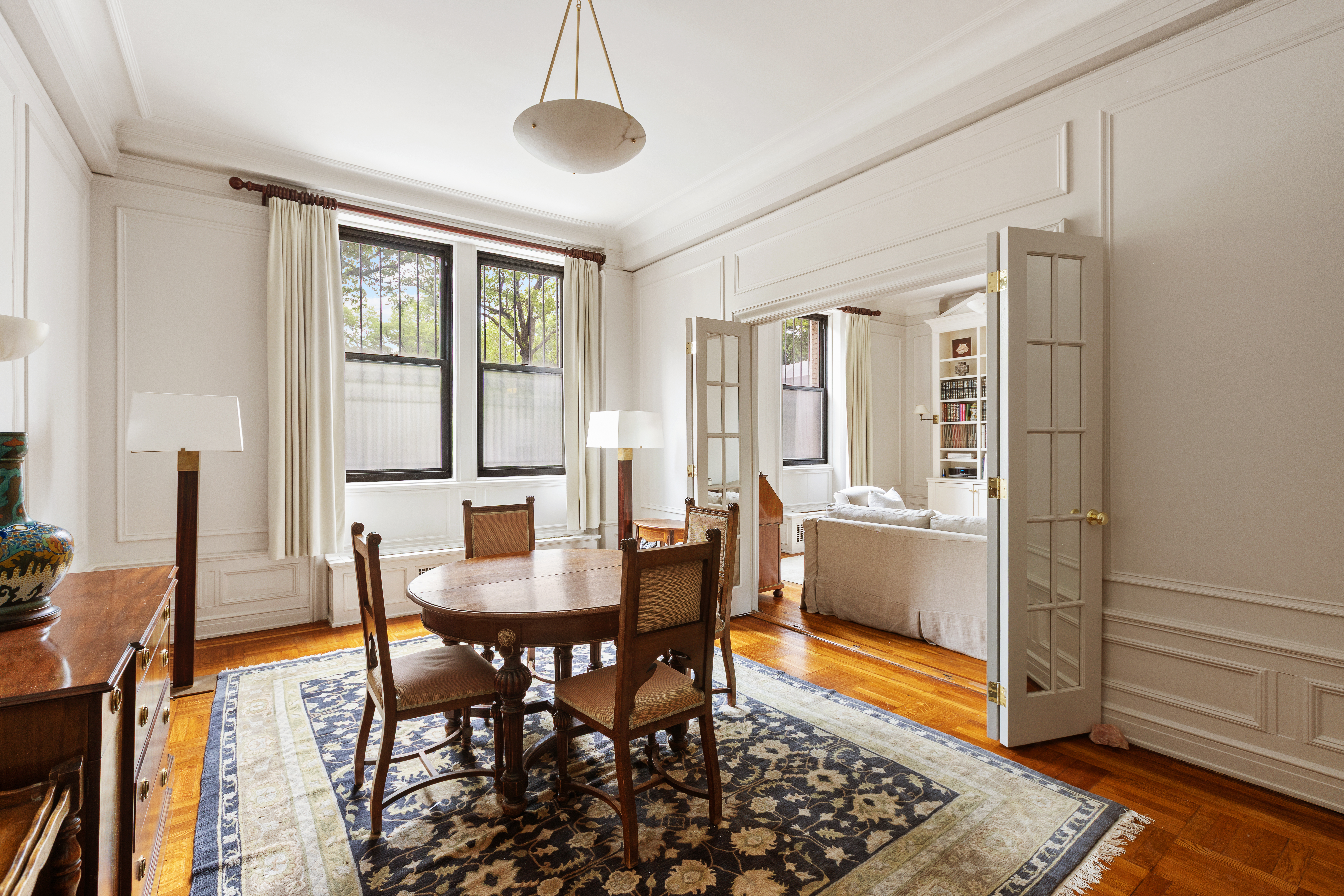 271 Central Park West, Unit 1D Manhattan, NY 10024 - Photo 5 of 12 a dining room with furniture and window