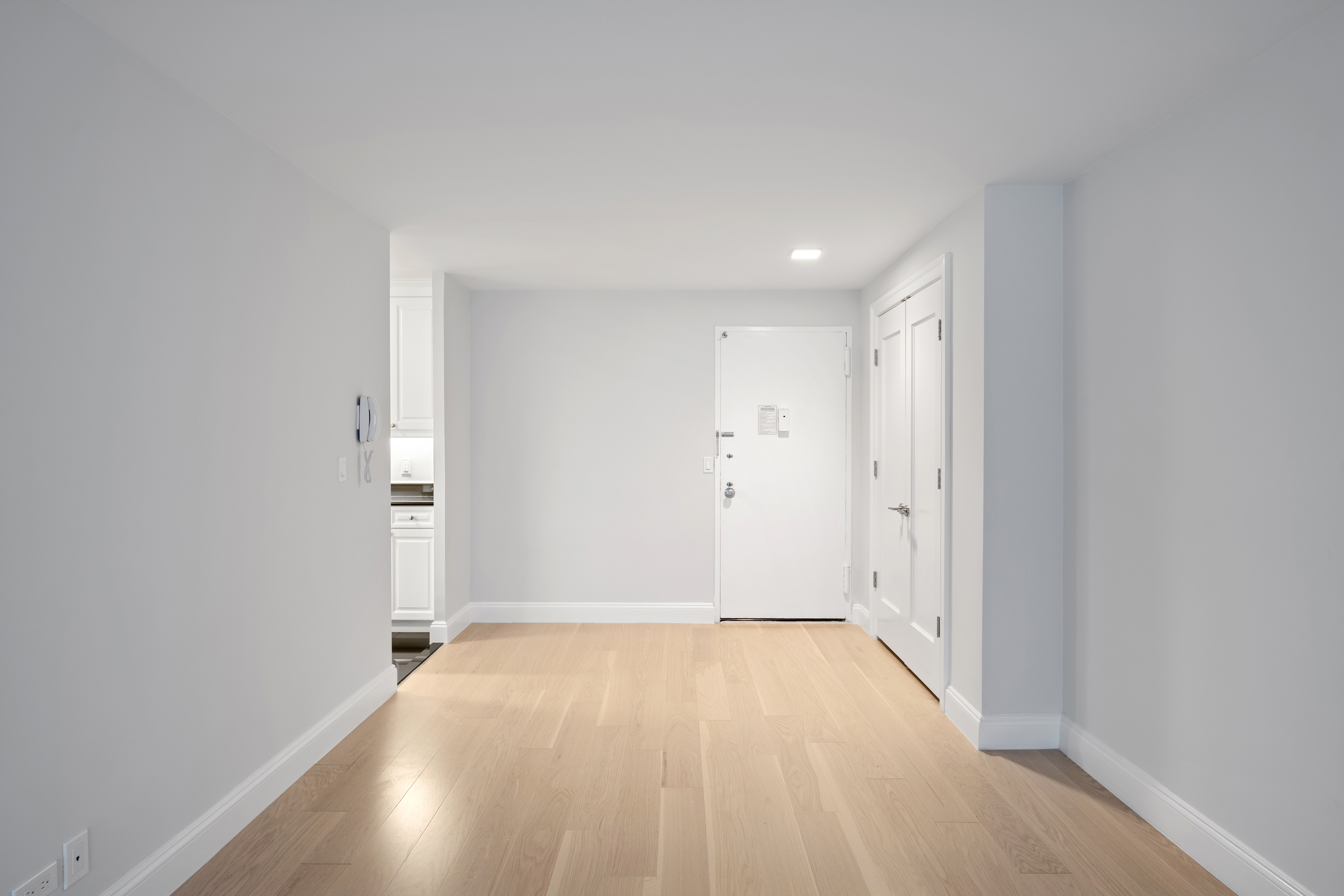 155 West 68th Street, Unit 815 Manhattan, NY 10023 - Photo 5 of 14 a view of a room with wooden floor