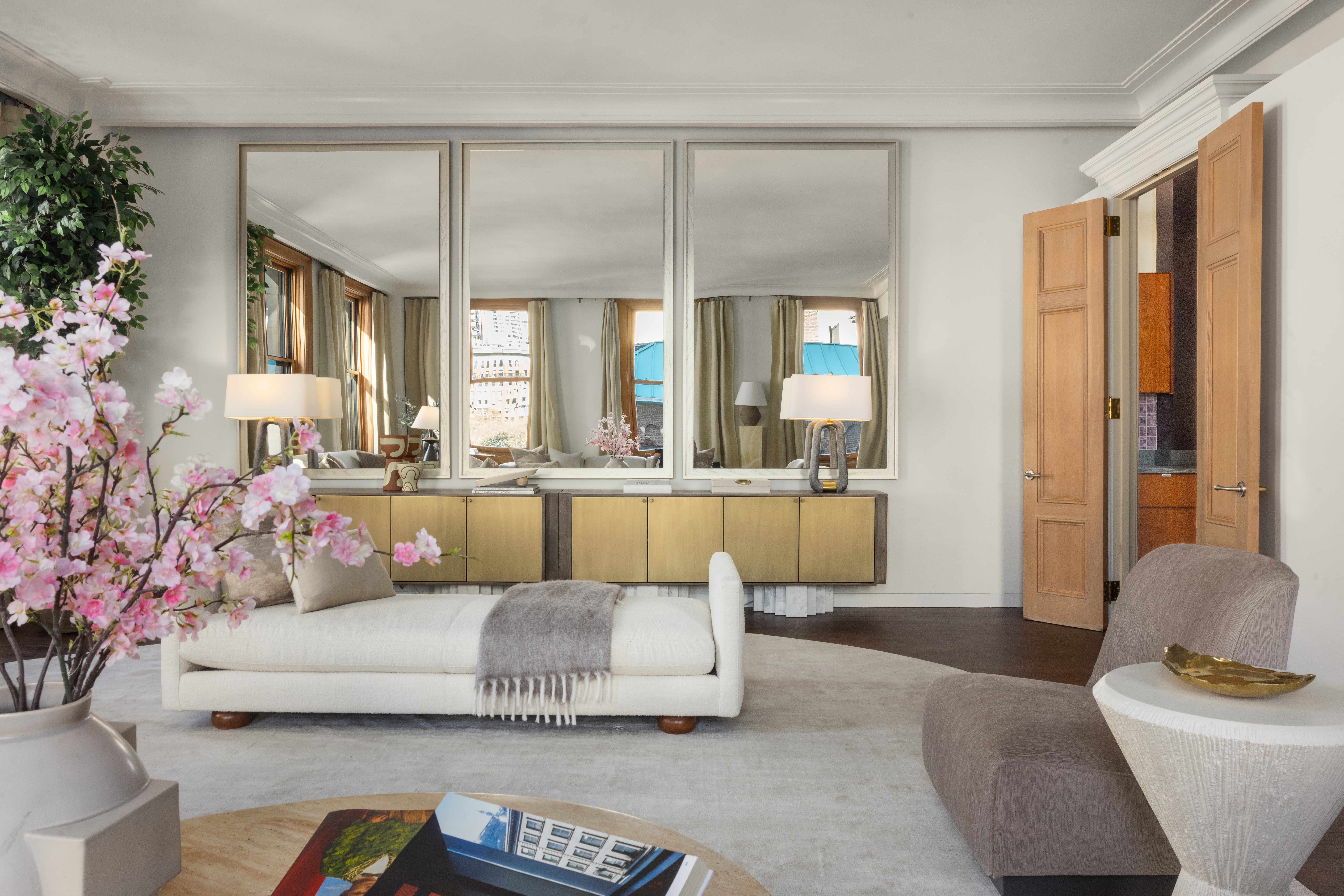 170 5th Avenue, Unit 5 Manhattan, NY 10010 - Photo 3 of 22 a living room with furniture and a large window