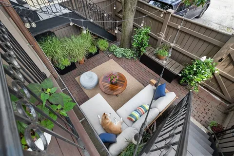 a backyard of a house with lots of green space