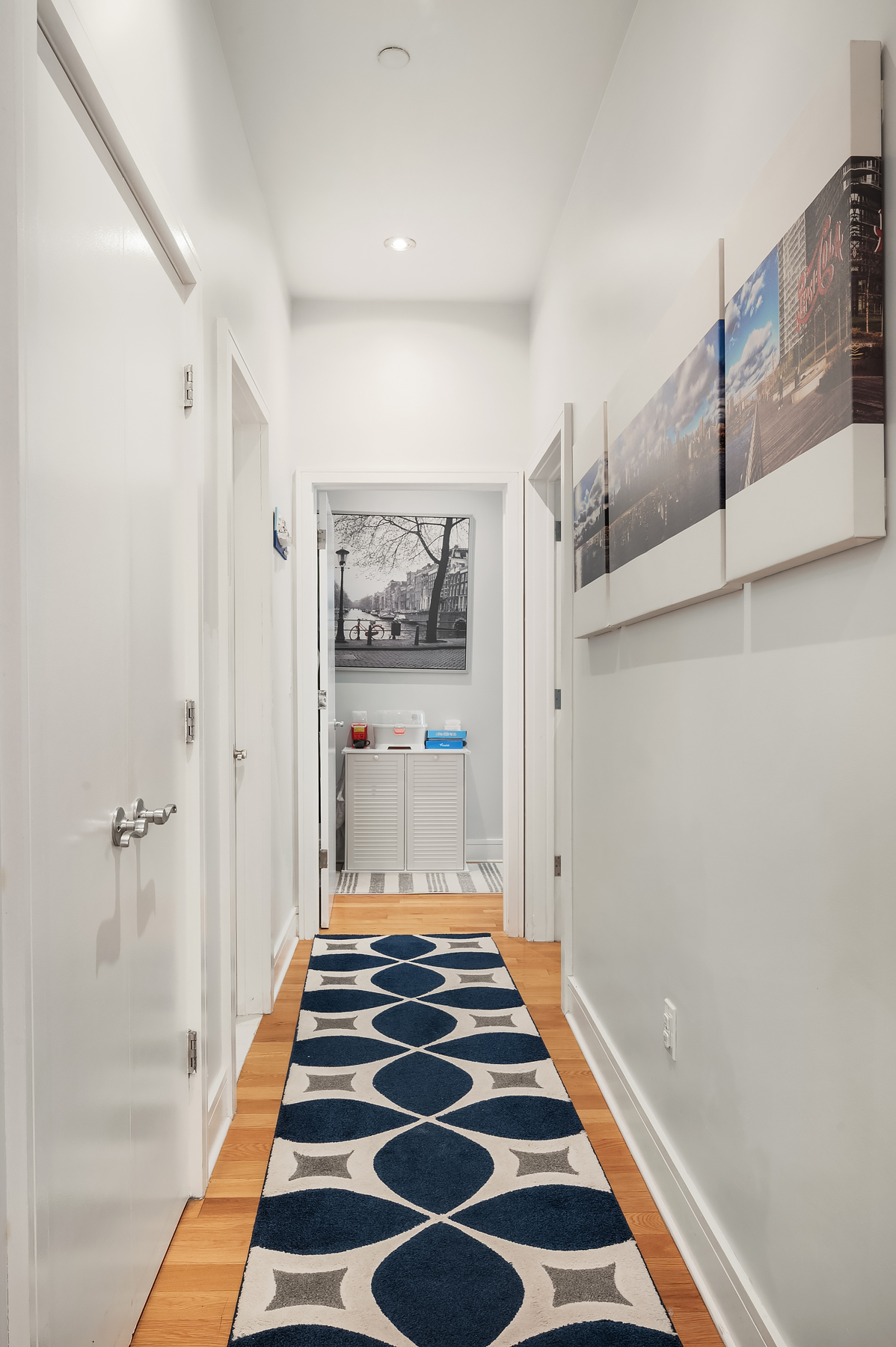 41-26 27th Street, Unit 5E Queens, NY 11101 - Photo 5 of 12 a view of a gallery with wooden floor