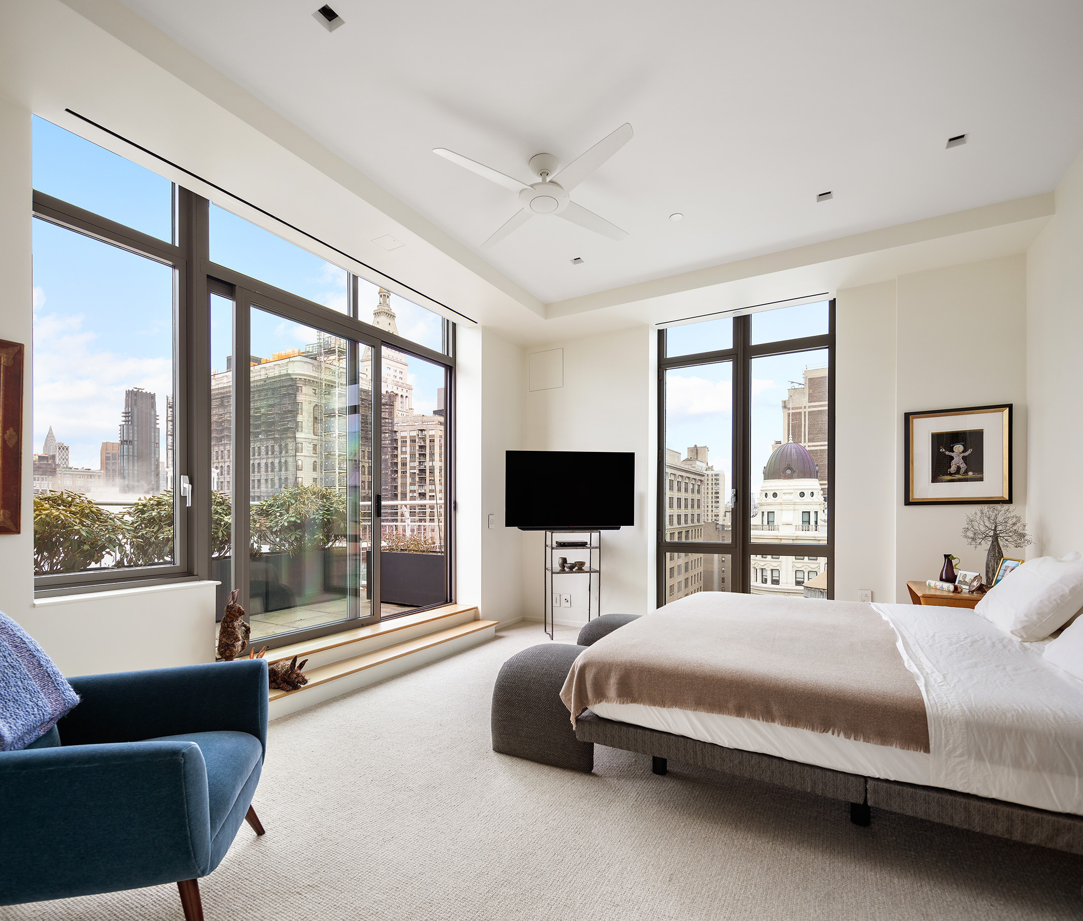 4 West 21st Street, Unit PH Manhattan, NY 10010 - Photo 9 of 14 a bedroom with a large bed and a couch