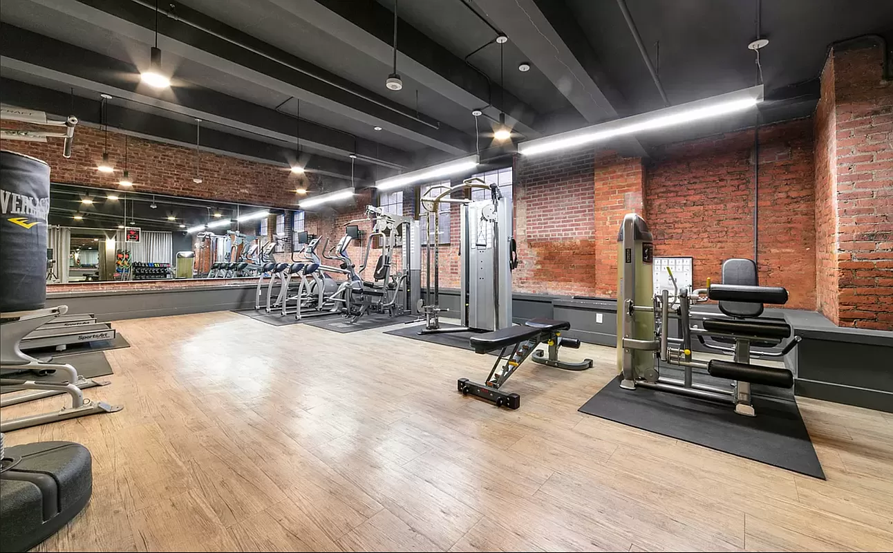 180 Bainbridge Street, Unit 305 Brooklyn, NY 11233 - Photo 14 of 23 a view of a room with gym equipment