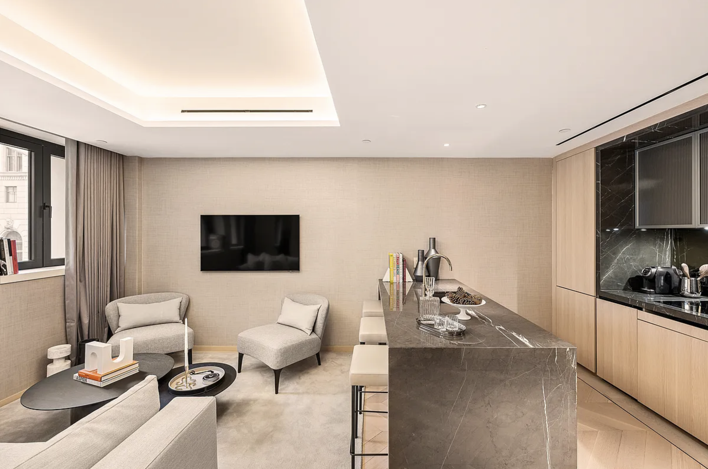 685 5th Avenue, Unit 6B Manhattan, NY 10022 - Photo 3 of 18 a living room with furniture and a flat screen tv