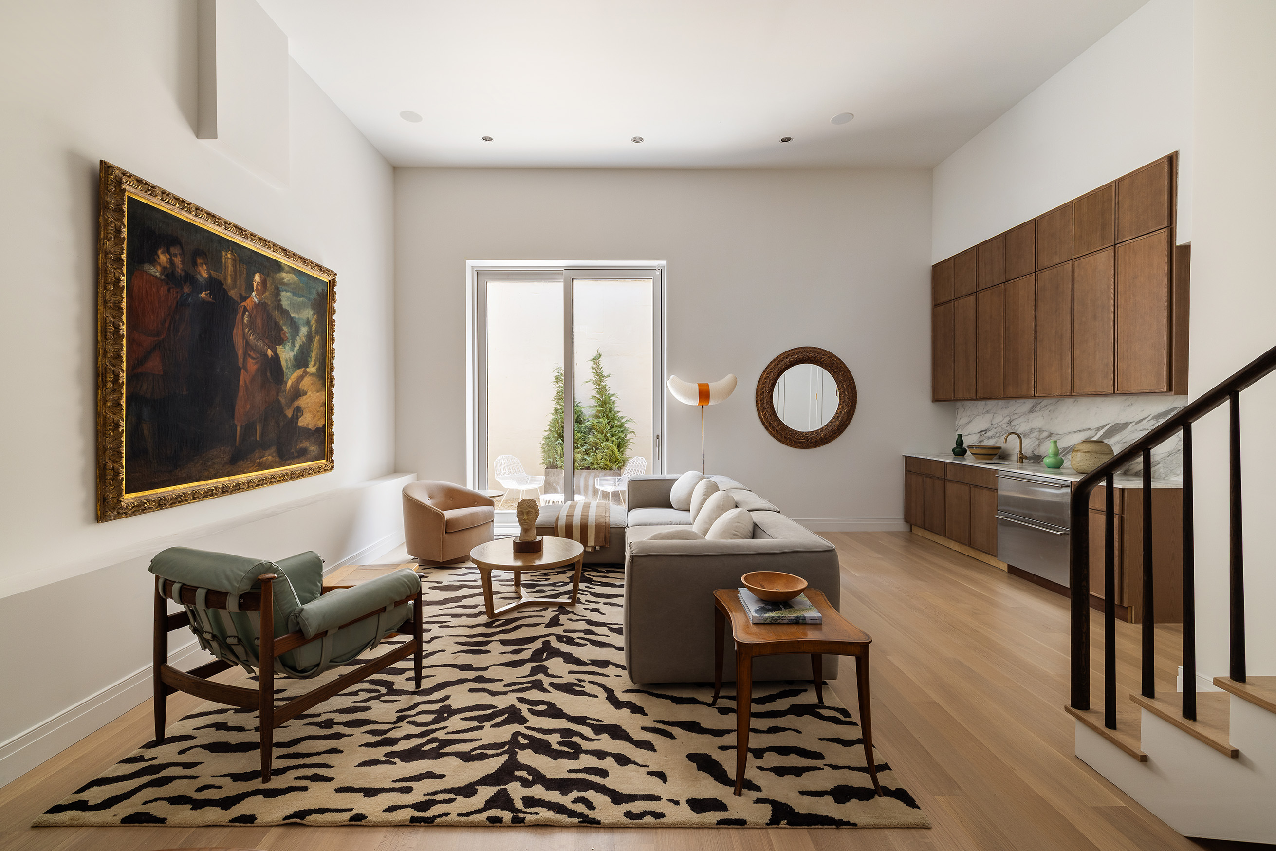 205 Clinton Street Brooklyn, NY 11201 - Photo 23 of 39 a living room with furniture a rug and a window