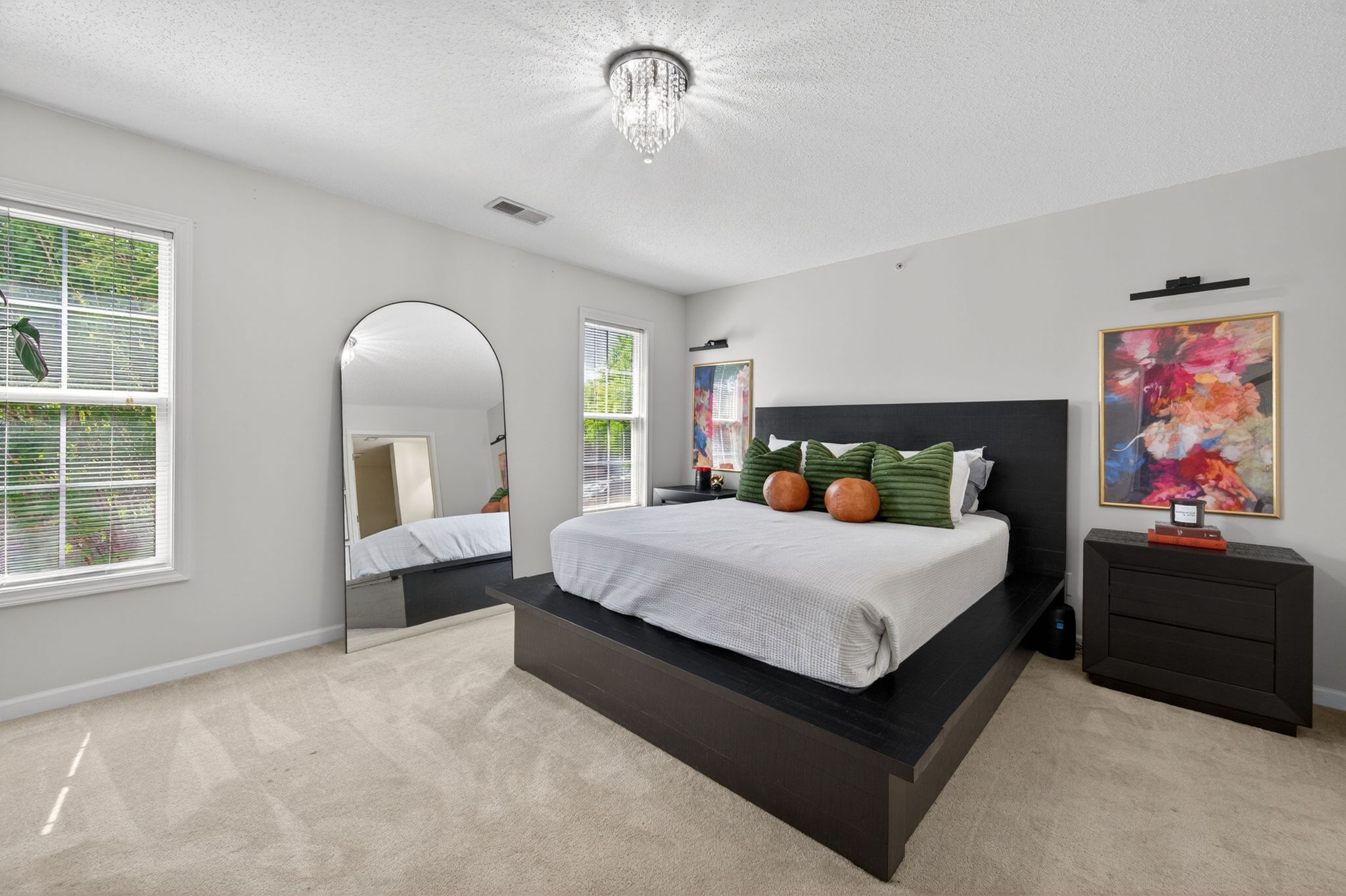 Huntscroft Lane Raleigh, NC 27617 - Photo 43 of 49 a bedroom with a large bed and a window