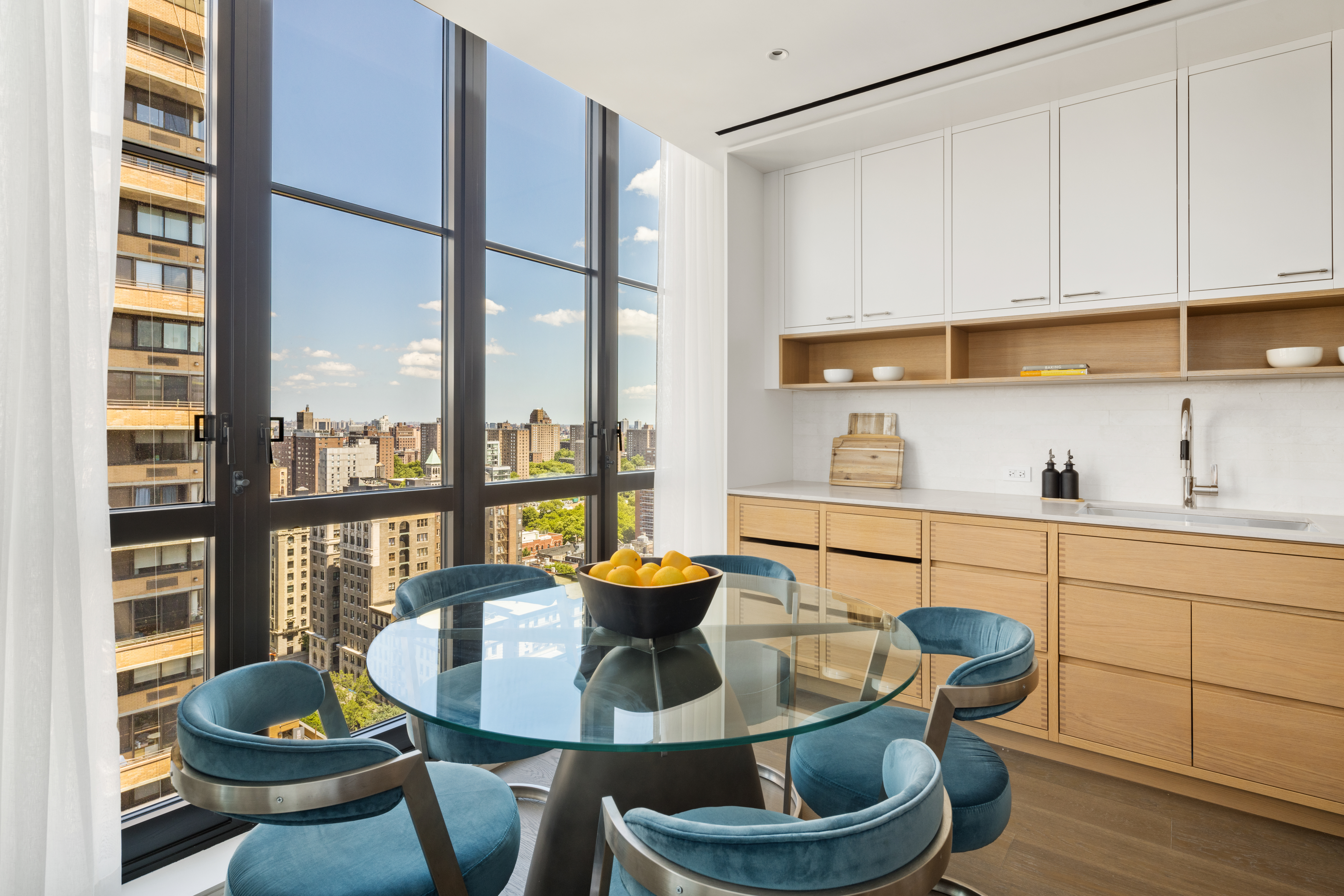 250 West 96th Street, Unit PHA Manhattan, NY 10025 - Photo 6 of 33 a dining room with furniture and a floor to ceiling window