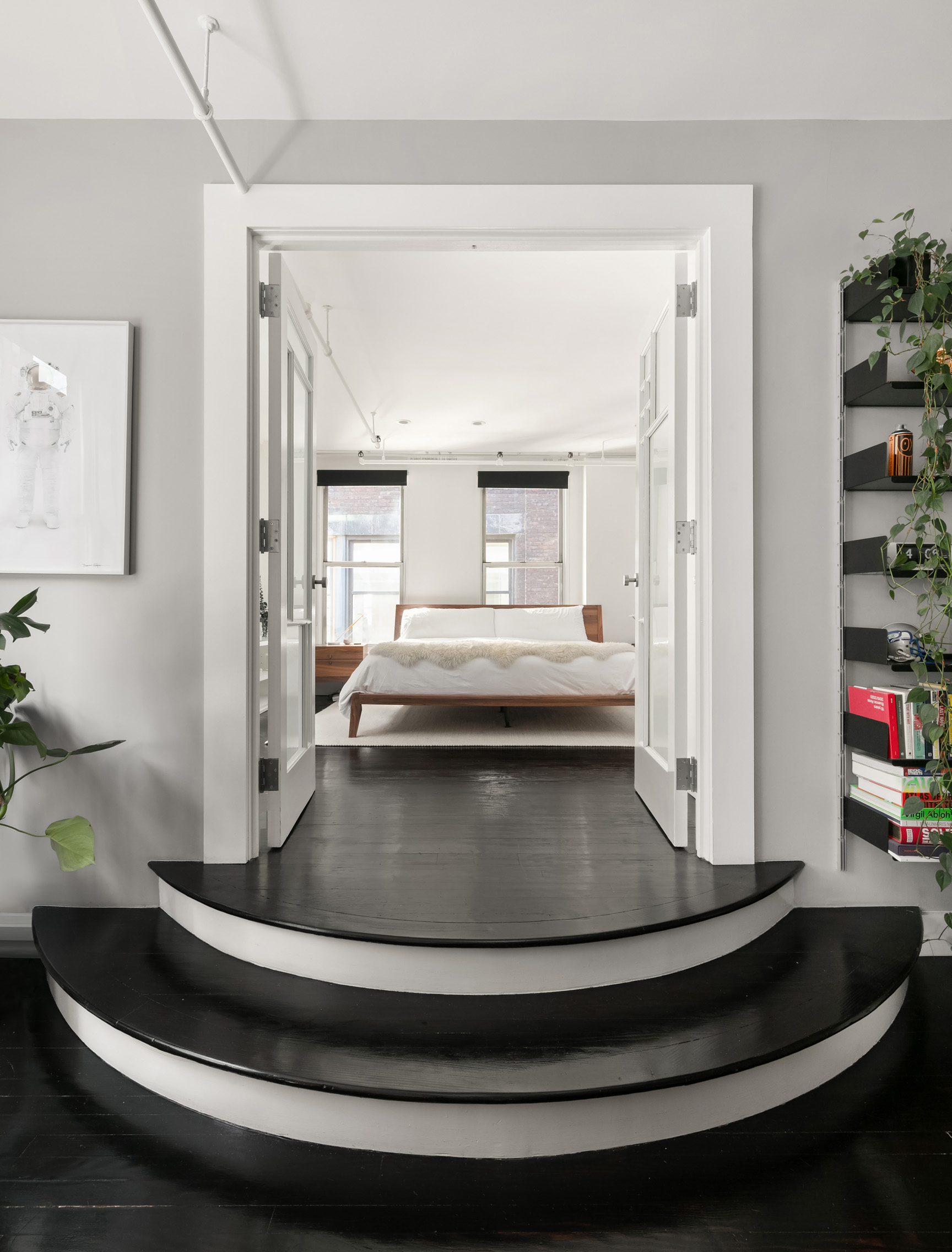 133-131 West 28th Street, Unit 6C Manhattan, NY 10001 - Photo 5 of 10 a view of a living room and chandelier