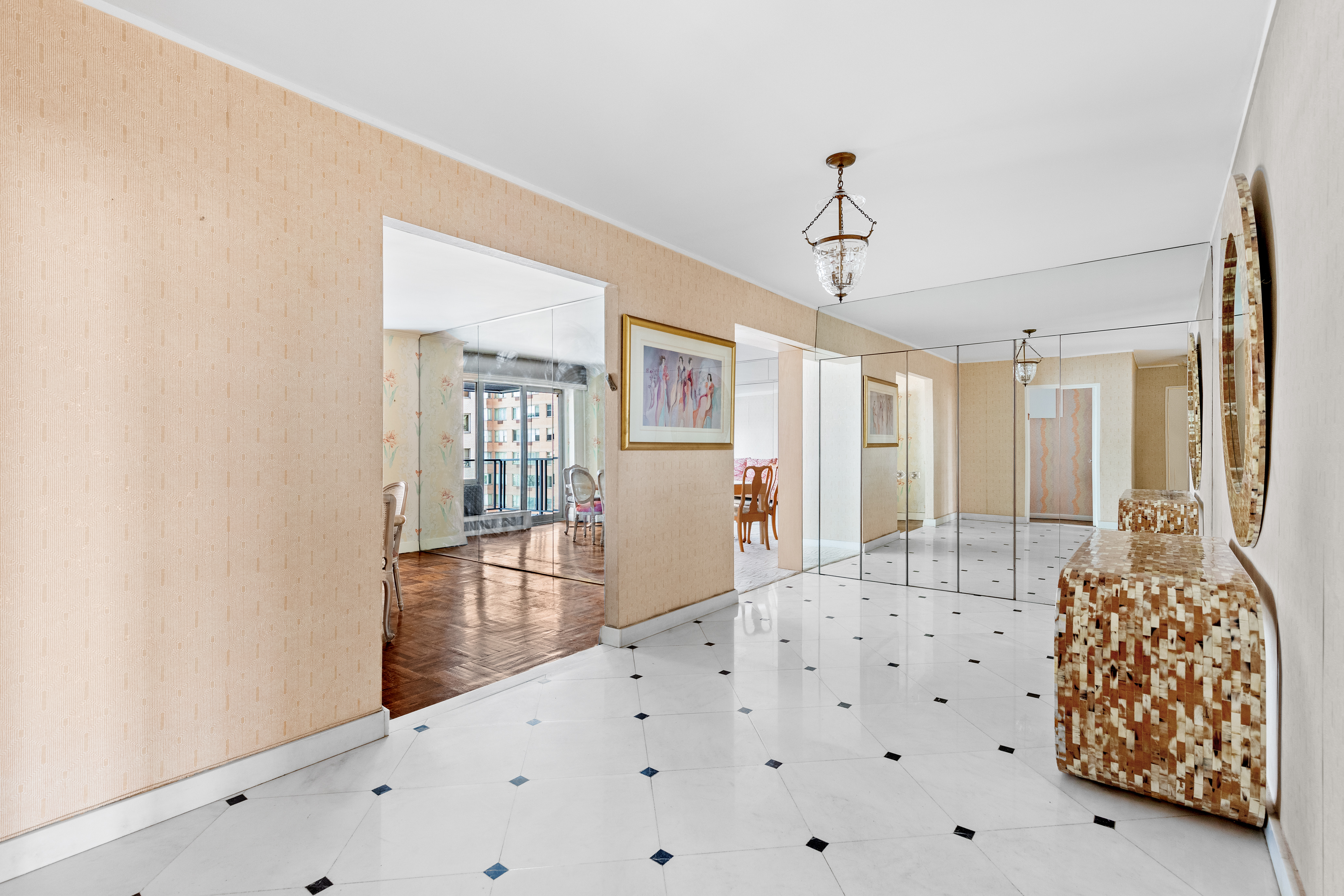 50 Sutton Place South, Unit 7A Manhattan, NY 10022 - Photo 3 of 16 a living room with furniture and window