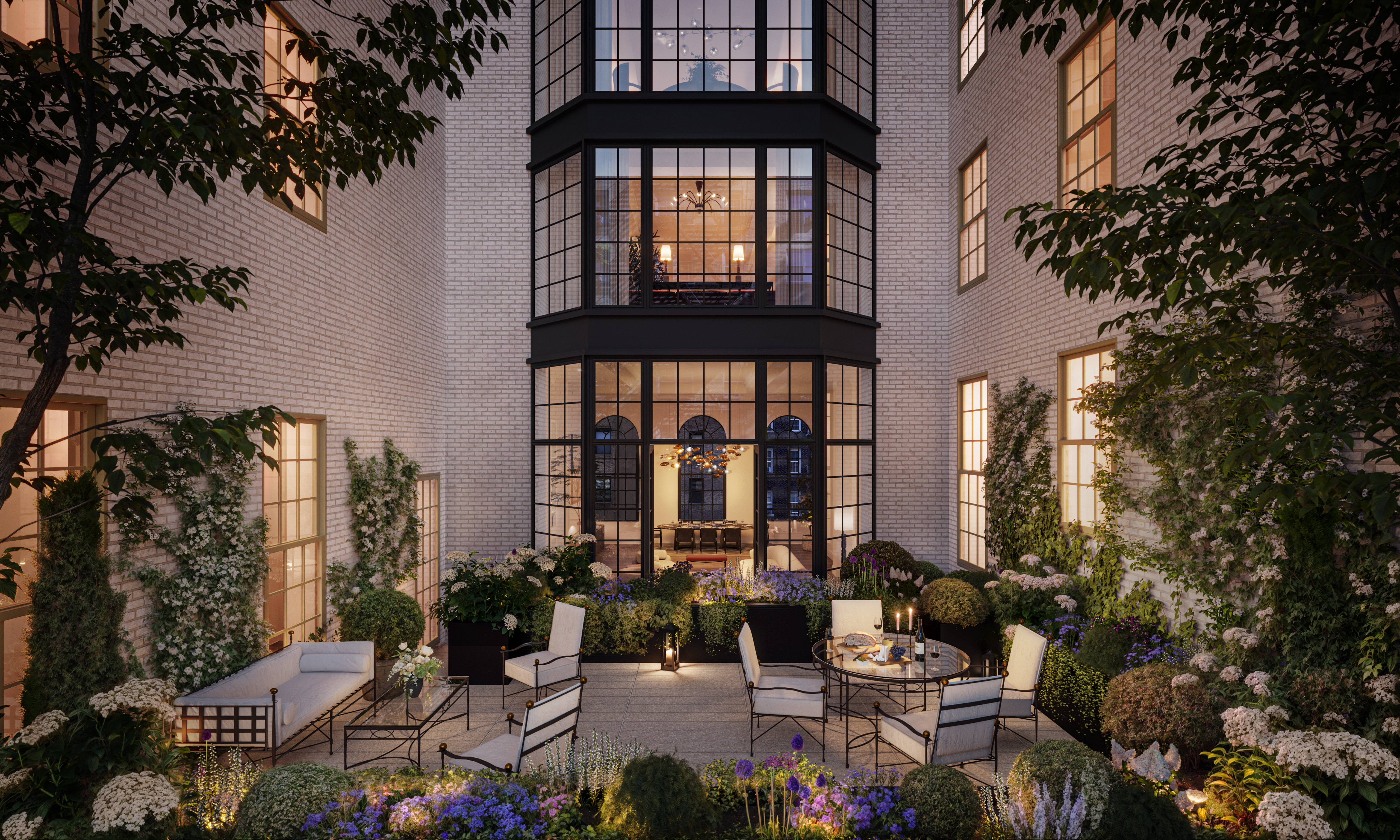 a view of a patio with couches table and chairs and potted plants