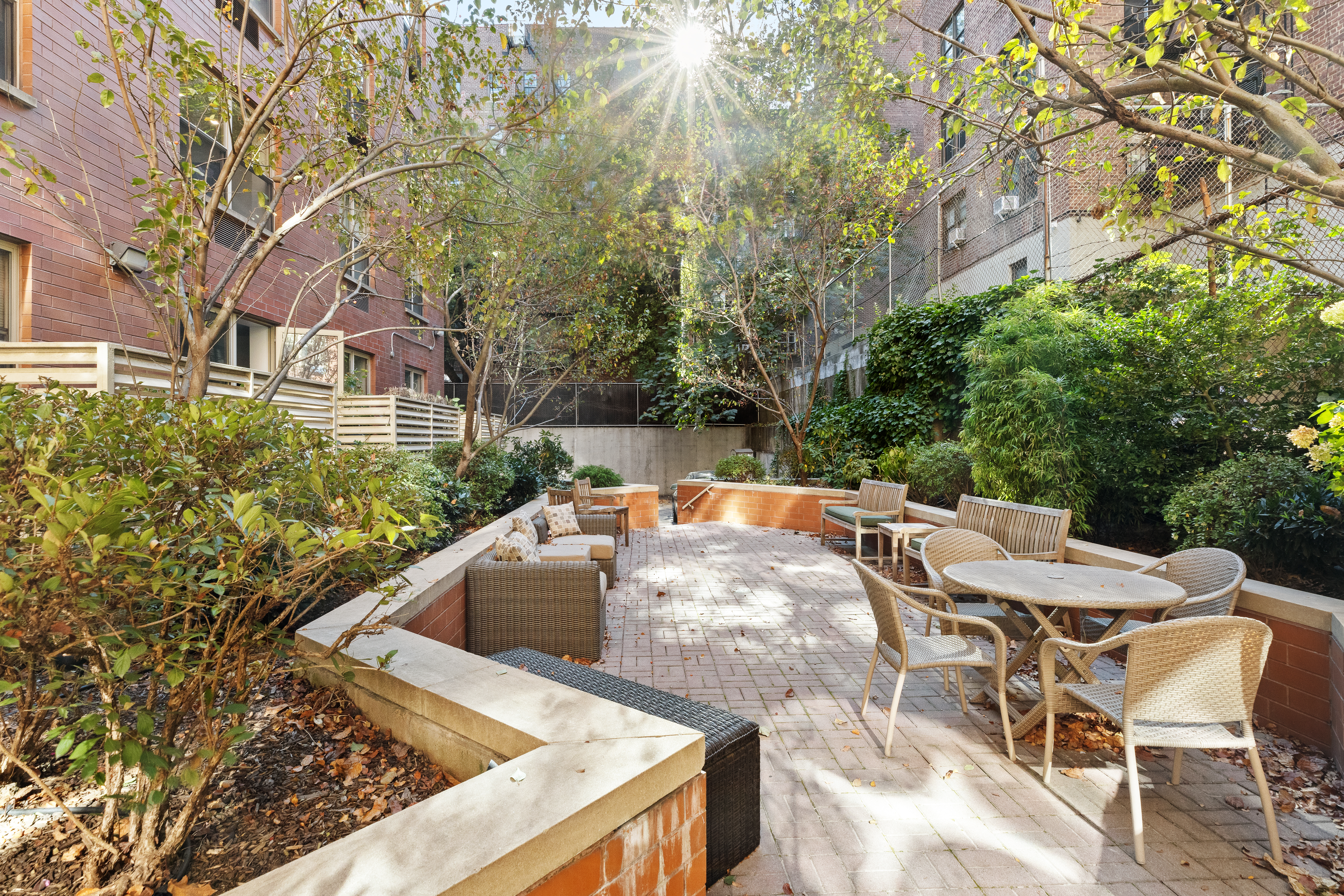 736 West 187th Street, Unit 303 Manhattan, NY 10033 - Photo 13 of 16 a view of backyard with swimming pool and seating