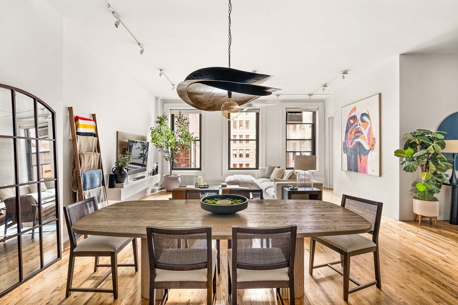 105 5th Avenue, Unit E5 Manhattan, NY 10003 - Photo 11 of 12 a dining room with furniture and window